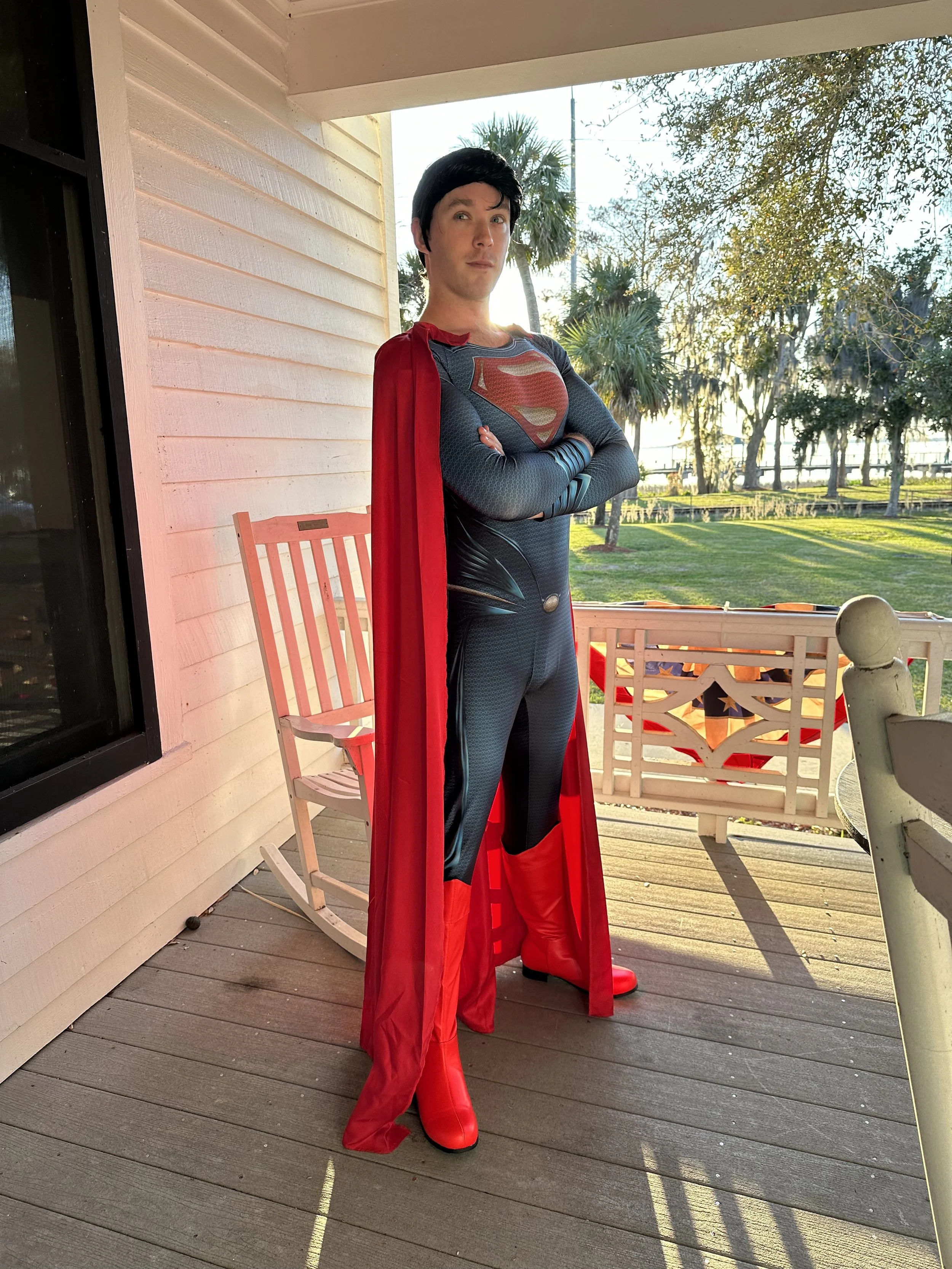 Superman-inspired superhero character performer at a children’s birthday party.