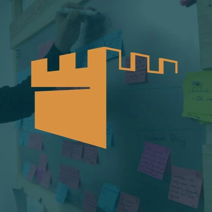 Keep Governance and Safeguarding go in gold, over an image of notes being written on a board on the wall.