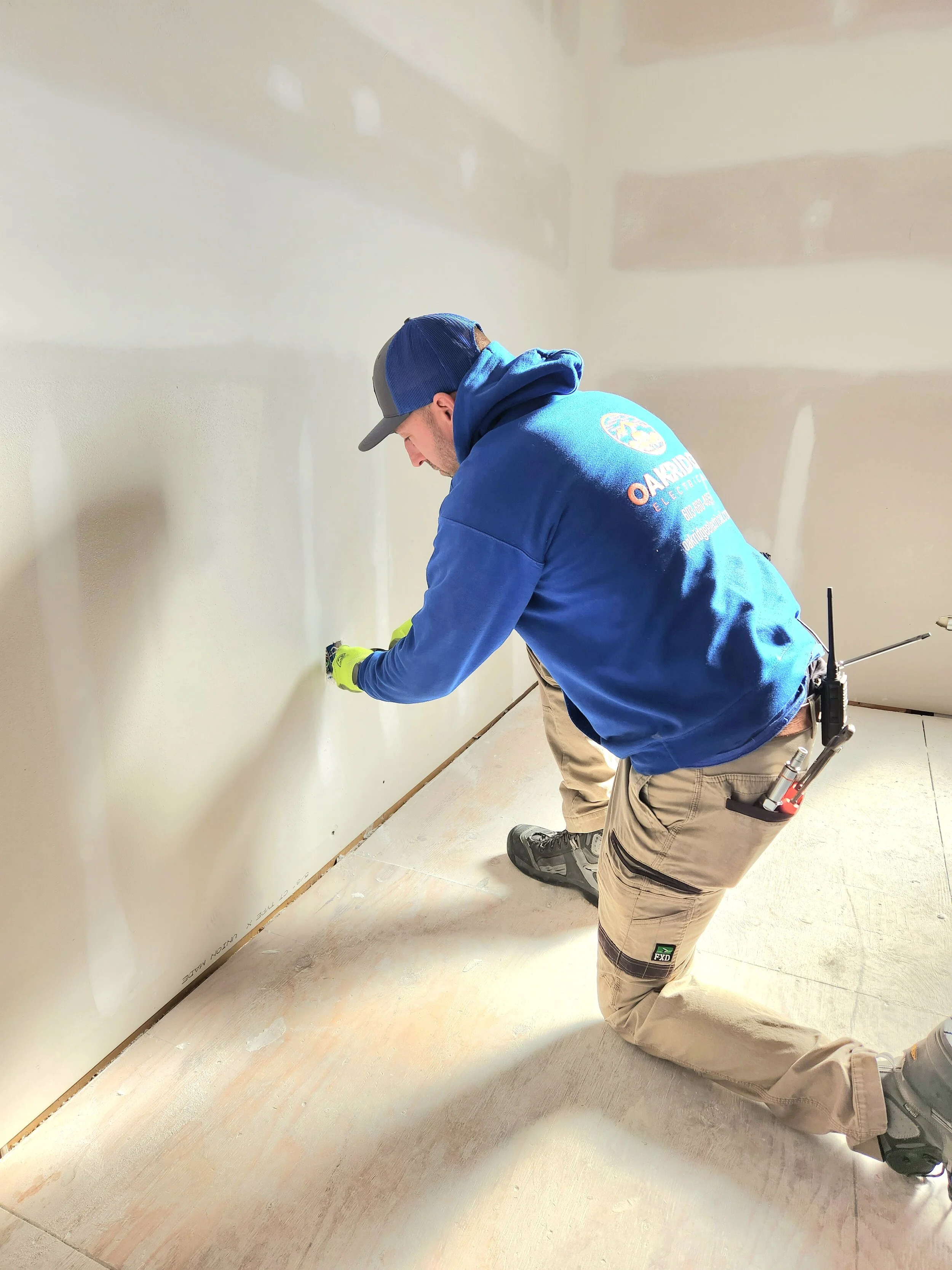 installation of multiple electrical outlets in apartment building renovations.