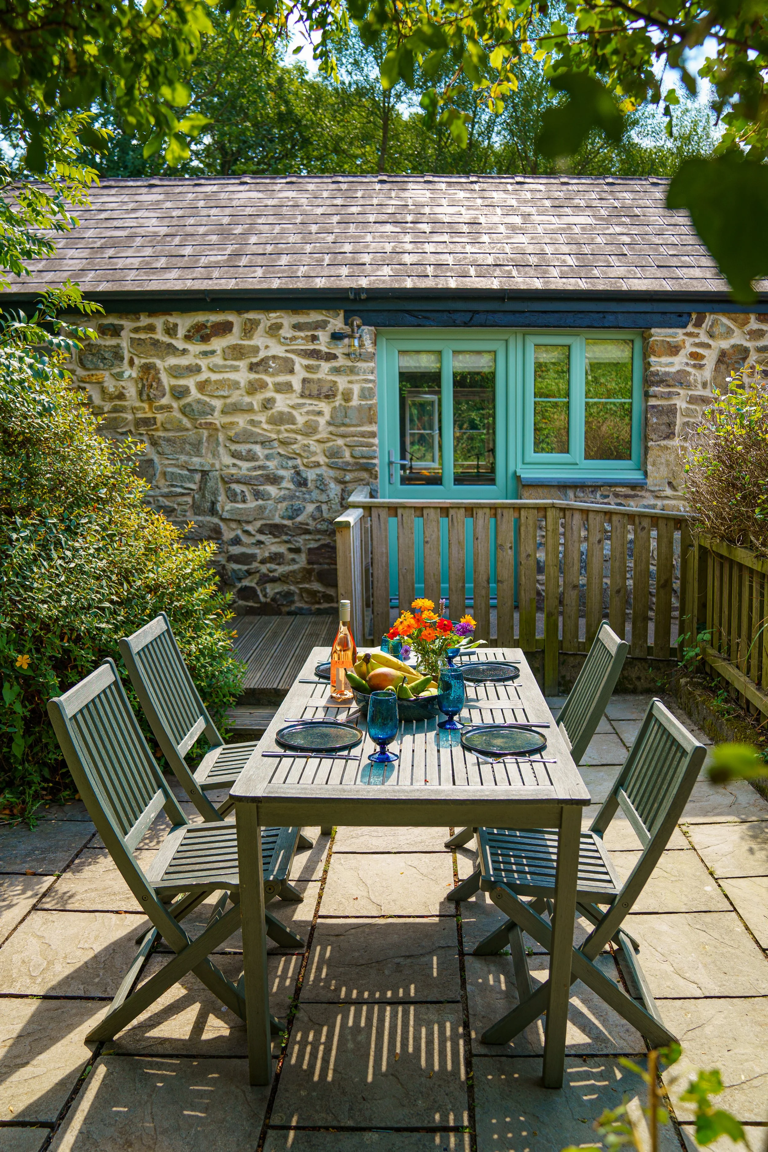 A Yr Ffald terrace table and front door copy 2.jpeg