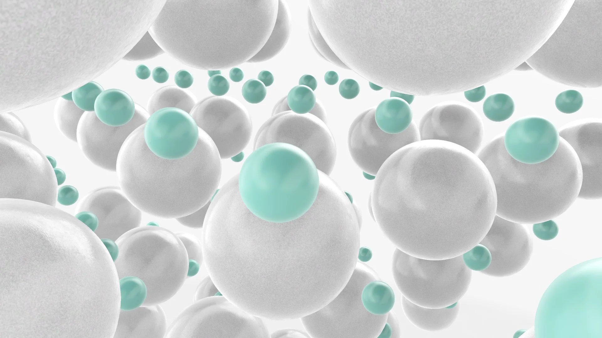 Multiple white and light blue spherical particles floating in space.