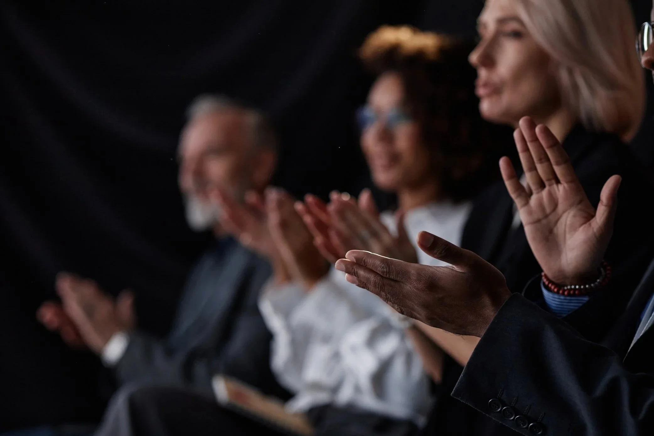 smiling-black-man-applauding-speech-at-business-co-2025-05-21-20-09-44-utc.jpg