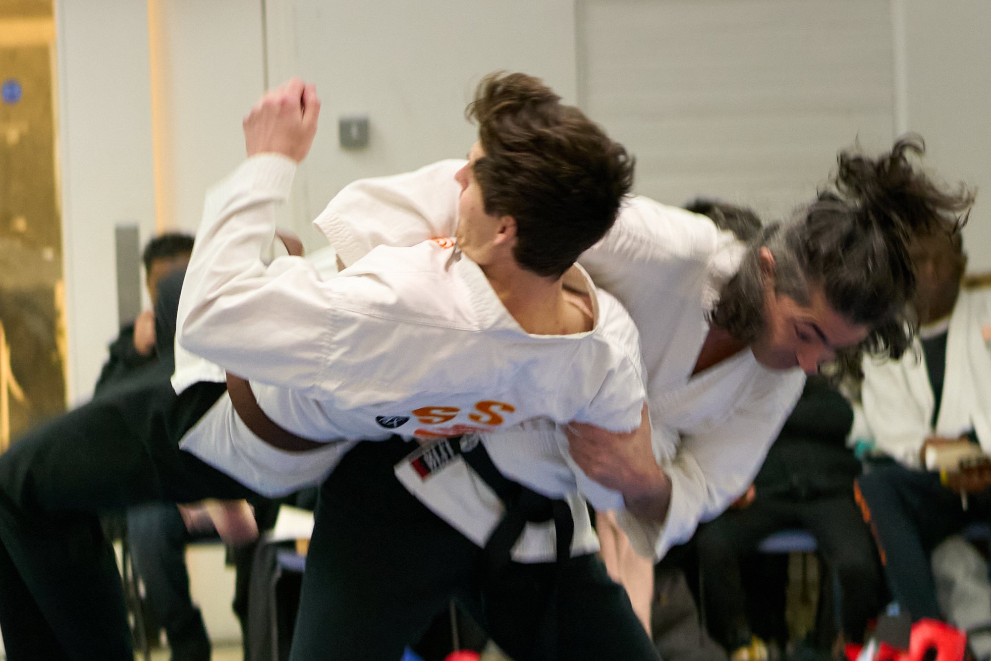 Leg sweep and hip throw combined.