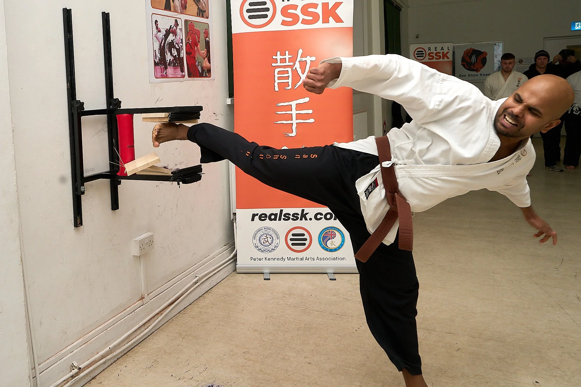 Satish side kicking wo boards as part of his Black Belt Grading.