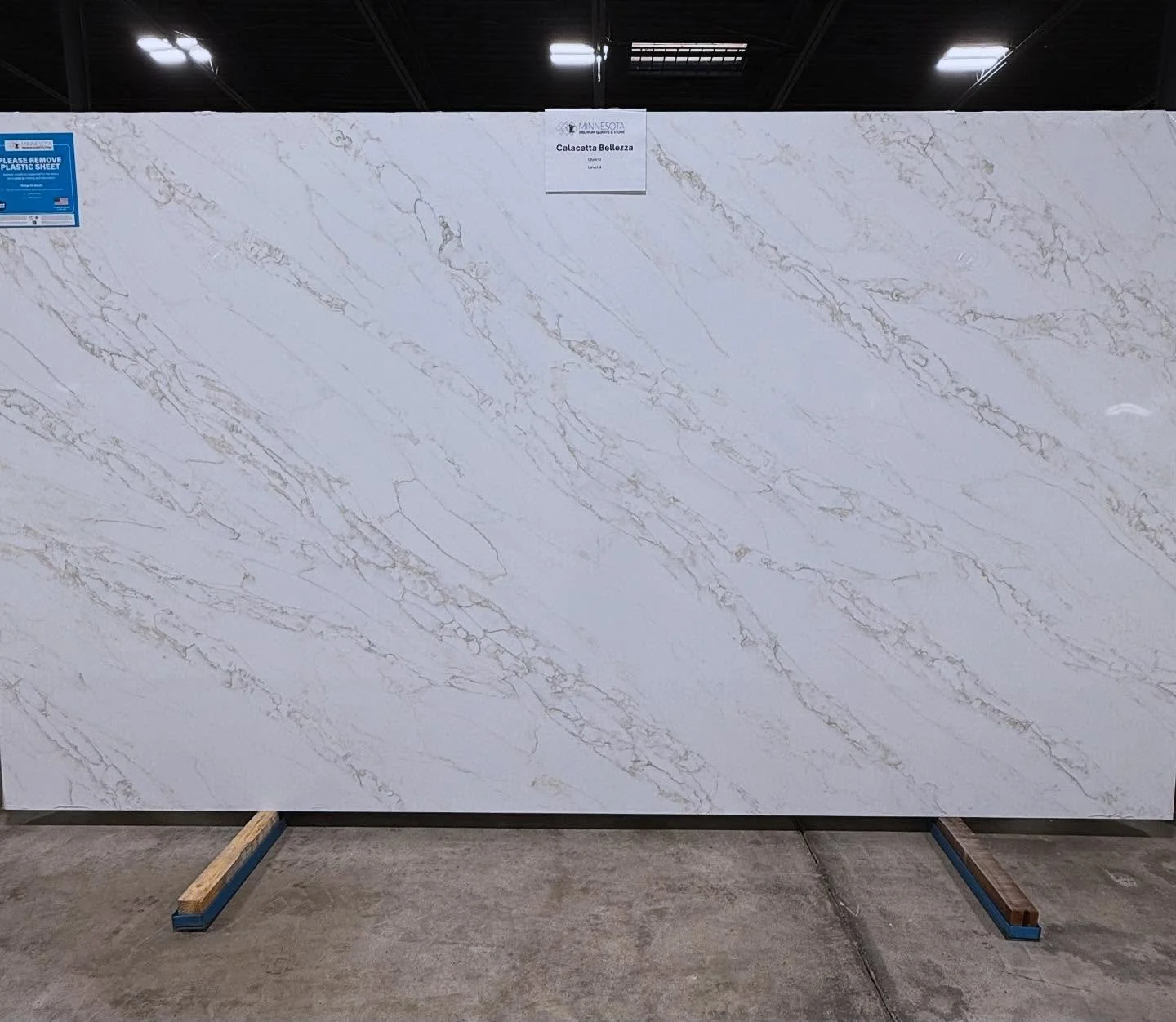 ✨Introducing Calacatta Bellezza from Minnesota Premium Quartz and Stone ✨A stunning new edition to our collection - this quartz slab showcases a radiant white backdrop paired with elegant warm veining. The perfect harmony of brightness and subtle sop