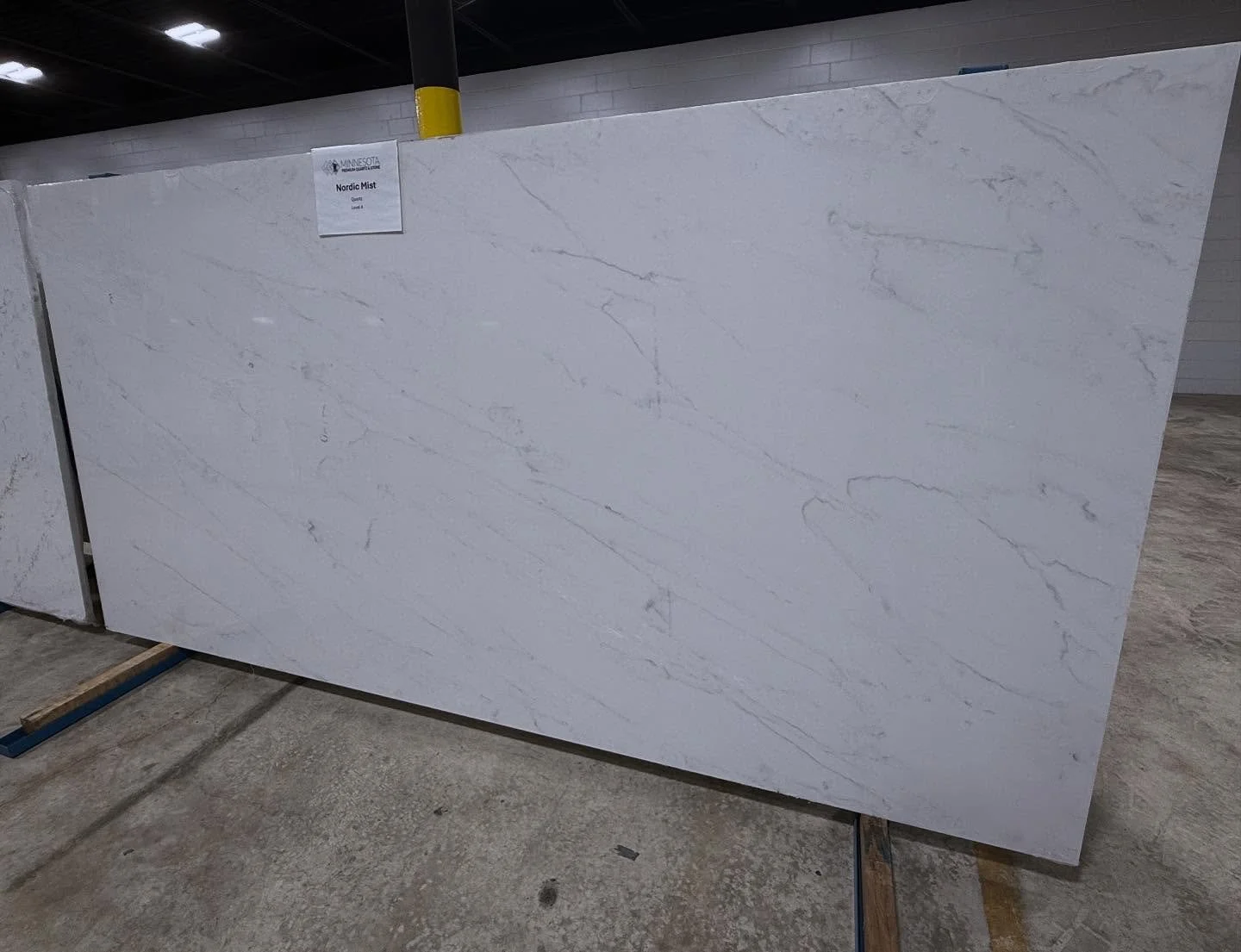 Our Nordic Mist Quartz is flying off the shelf! It's perfect for those seeking a subtle, natural marble look at an amazing price! Huge shoutout to @erkgranitellc for another fantastic install!