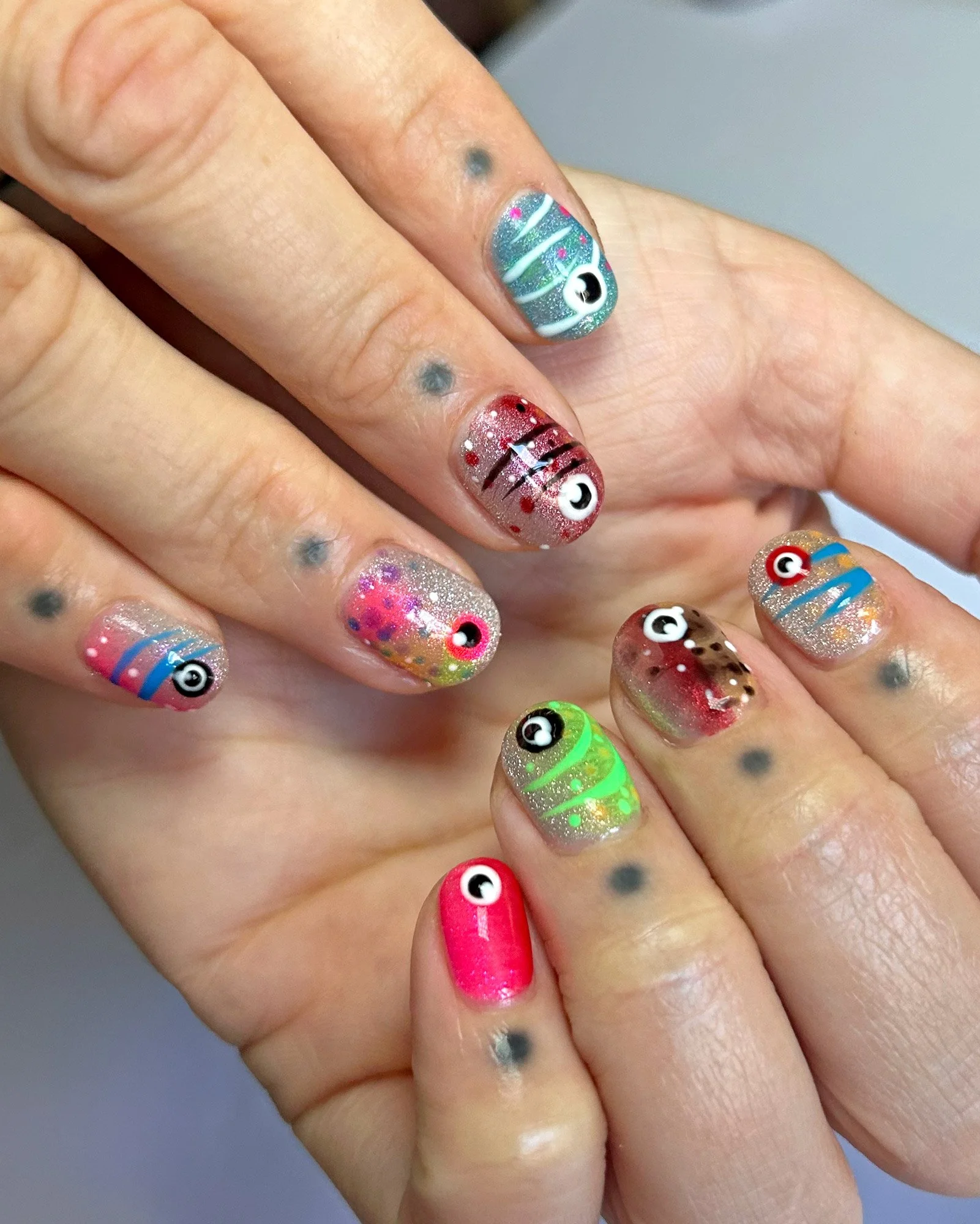 Nail-set-for-Britney-inspired-by-fishing-lures-on-natural-short-nails.jpg