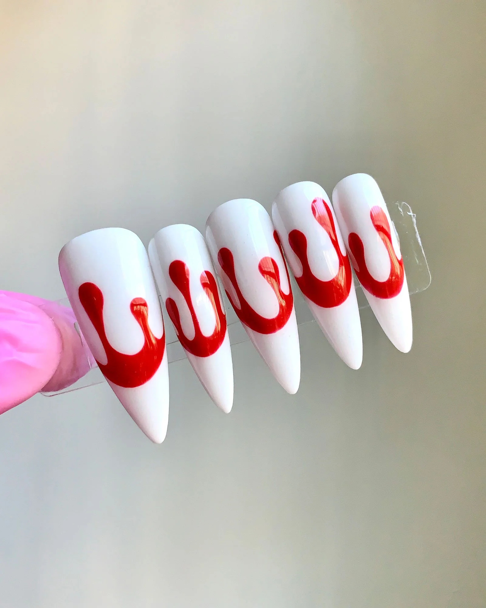 Press-on-nail-set-with-a-blood-drip-halloween-design-with-hand-painted-nail-art.jpg