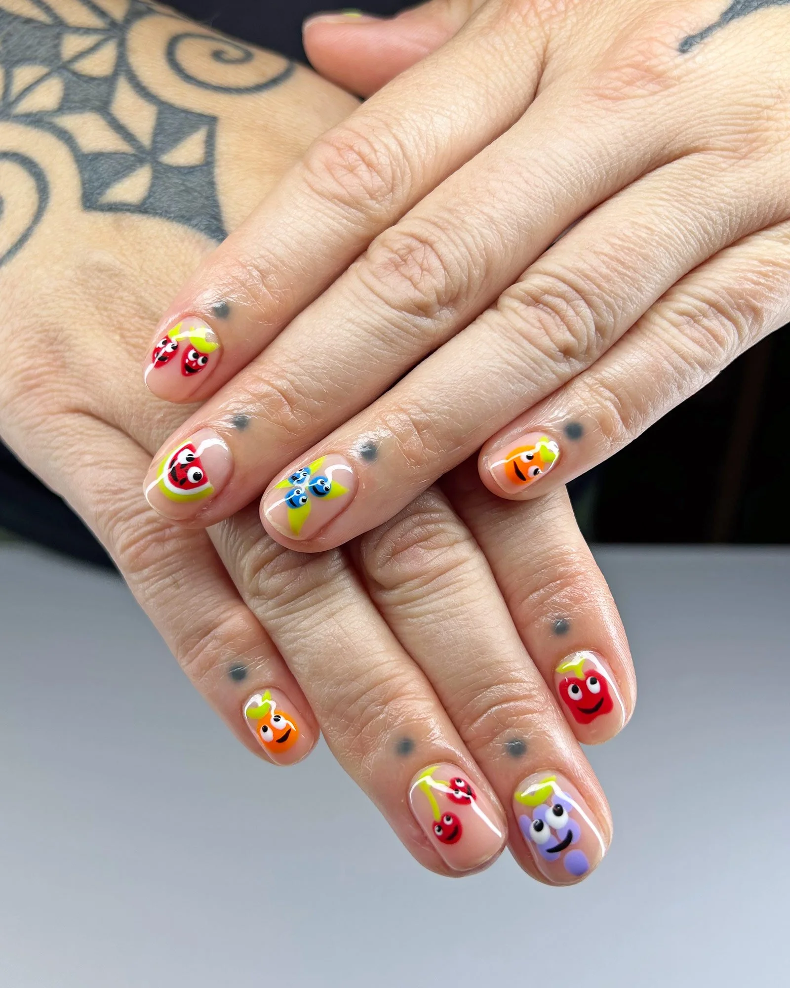 Googley-eyed-fruit-nail-art-on-natural-nails-painted-with-gel.jpg