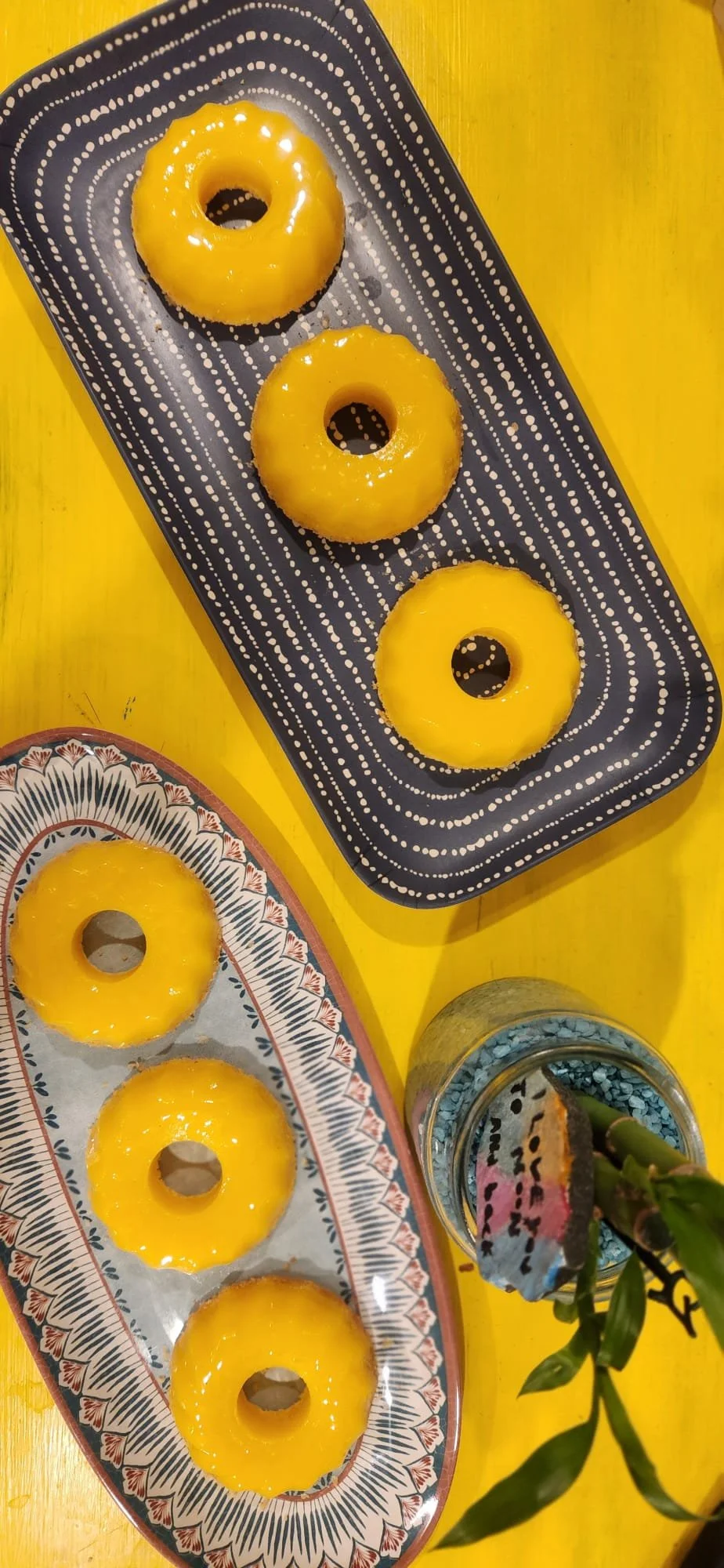 Small yellow, round desserts by Cinthia