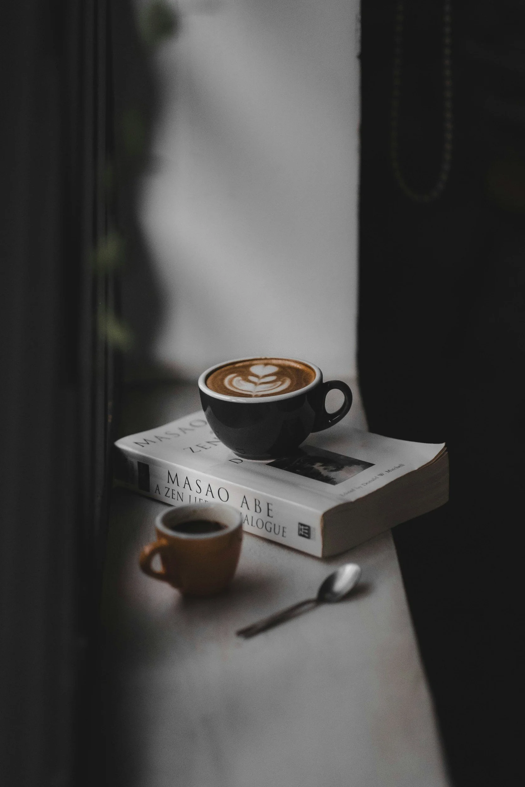 Coffee mug resting on a small table representing quiet rest, comfort, and supportive home care routines.