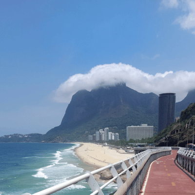 Arrival to São Conrado beach by bike.png