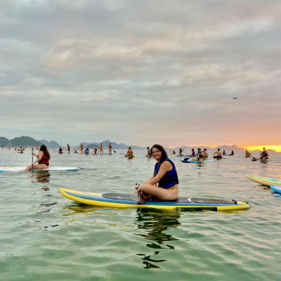 Sunrise stand up paddle Copacabana in a cloudy day.png