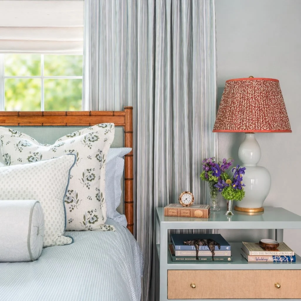 In a house full of boys, this room is Mom&rsquo;s.

Soft, feminine, and layered with florals, patterns, and (of course) PILES of pillows&mdash;just how she likes it.

The built-in shelves (complete with her desk/home office) were designed to tell her