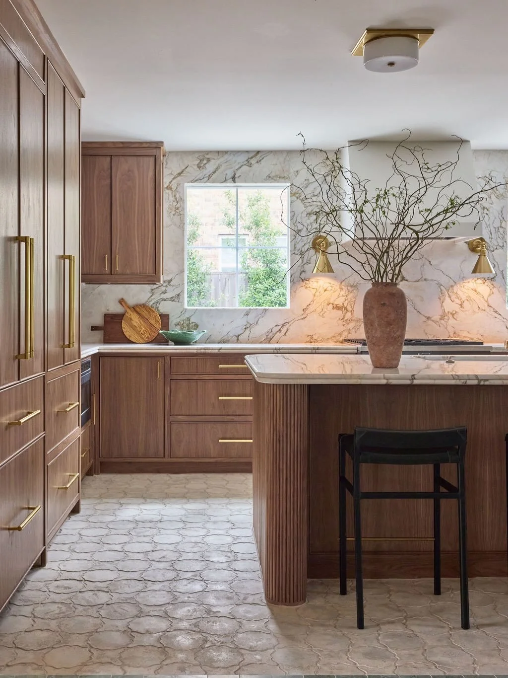 From builder basic to beautifully bespoke.

I&rsquo;ll be honest... I never hated the original kitchen. It was perfectly cute.

But she was never after &ldquo;cutesy.&rdquo;

She wanted warmth, earthiness, and just a touch of old world.

Rich walnut 