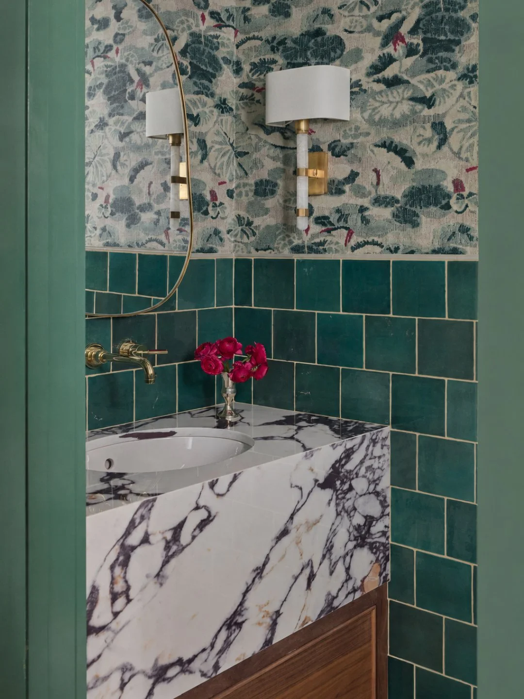 Maybe this whole powder bath was just a backdrop for one bronze koi. Lily pads, bright greens, fuchsia, Calacatta Viola&mdash;then our little fish, right where he belongs.⁠
⁠
#PowderBath #Scalamandre #BelleBaronDesign