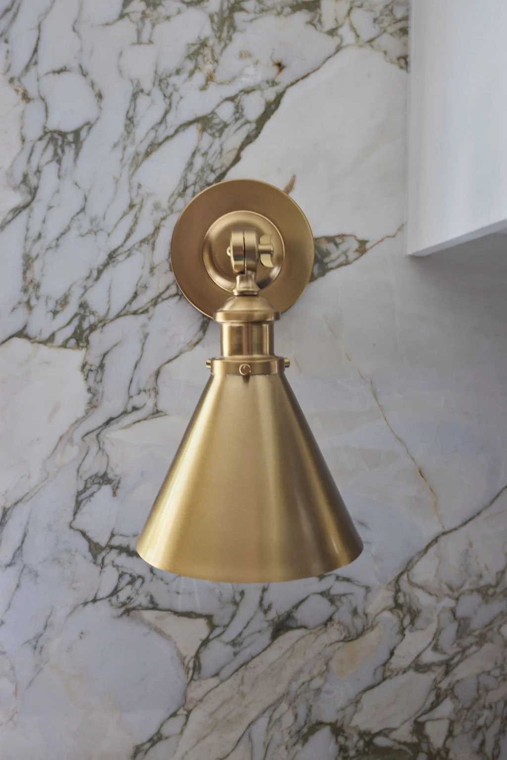 Teshoian Kitchen Detail Gold Light Fixture Closeup.jpg