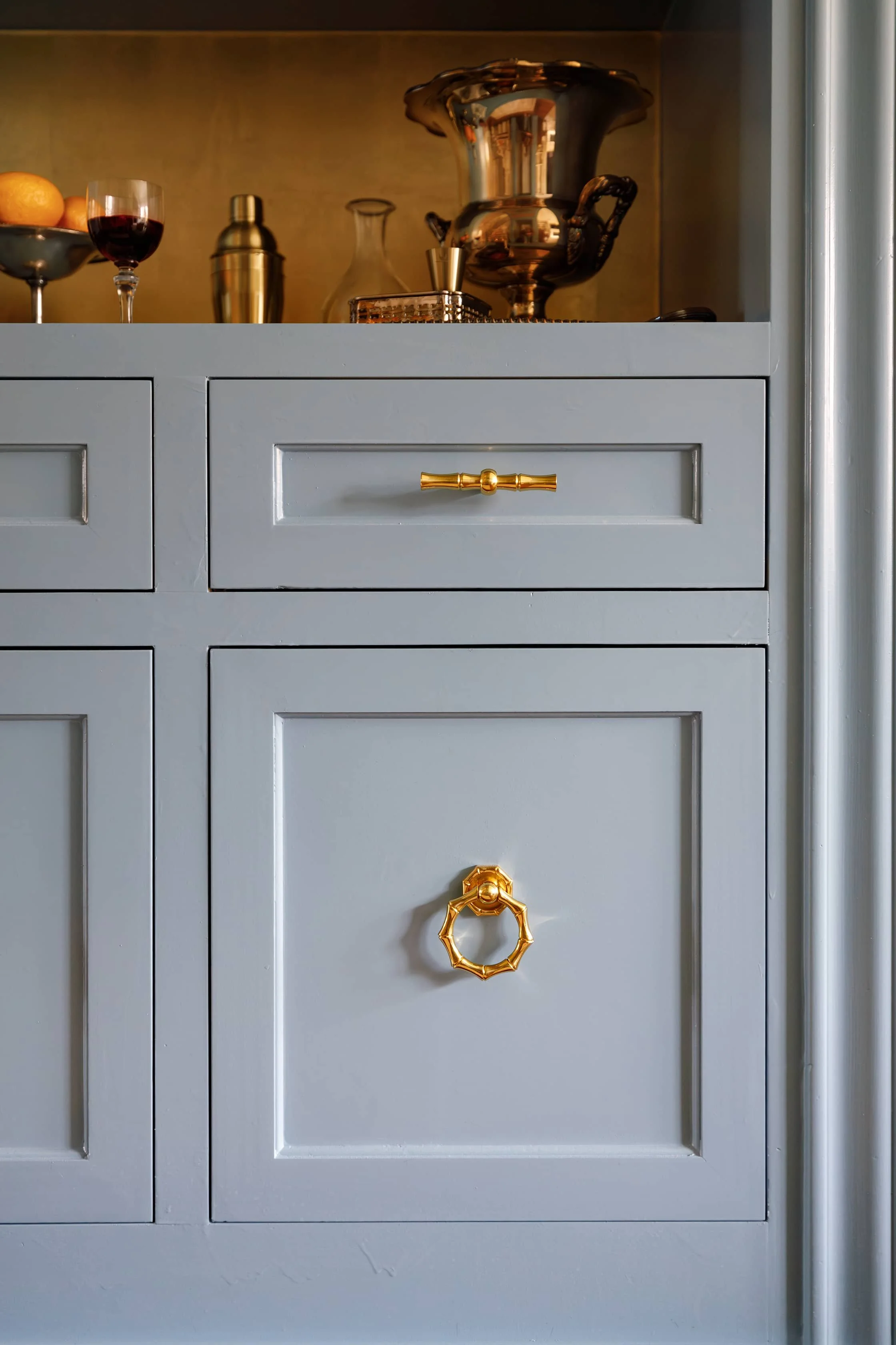 Olympia Helander Gold and Blue Arch Bar Cabinet Closeup.jpg