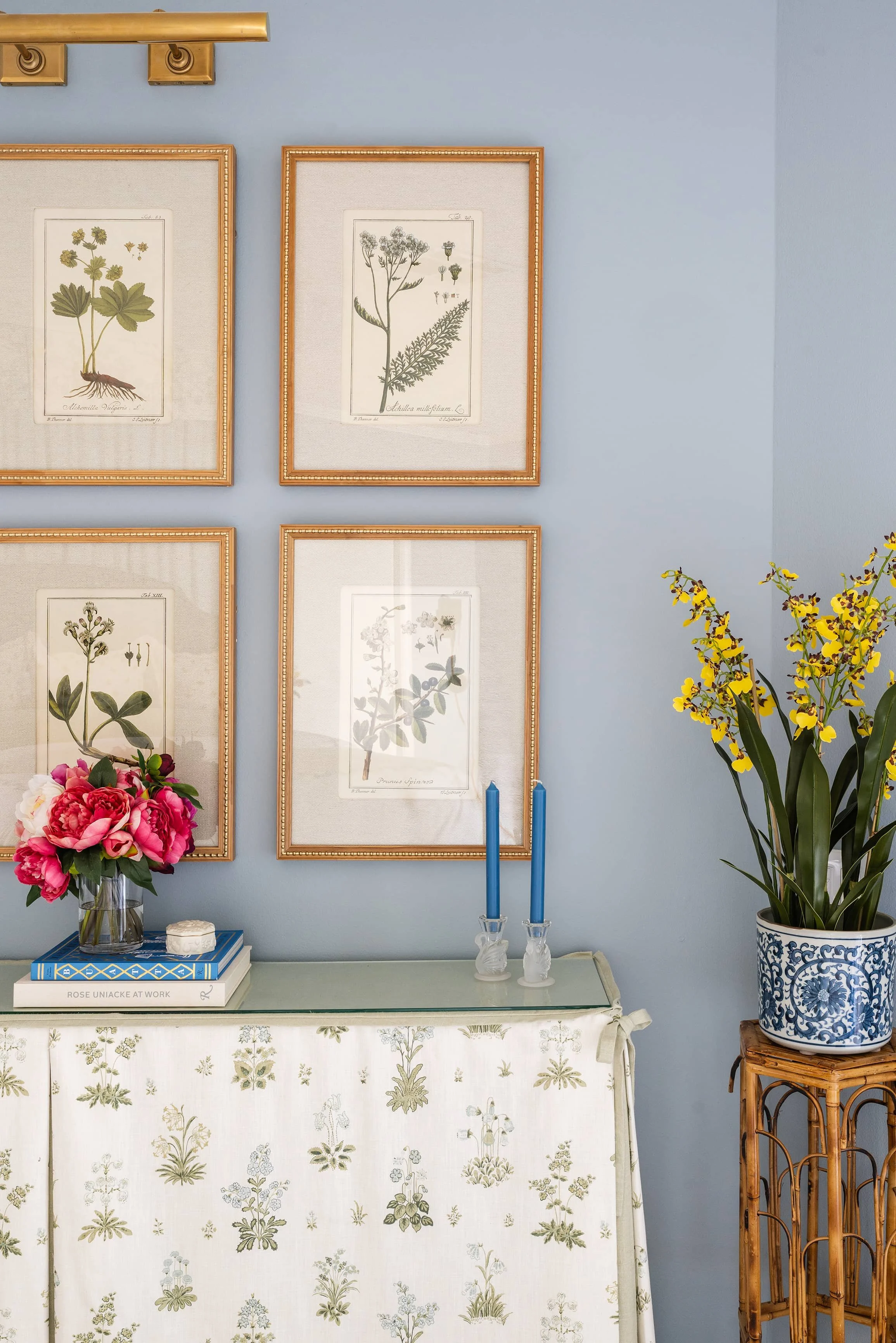 Storywood Tippit Primary Skirted Console Close Up with Bamboo Plant Stand.jpg
