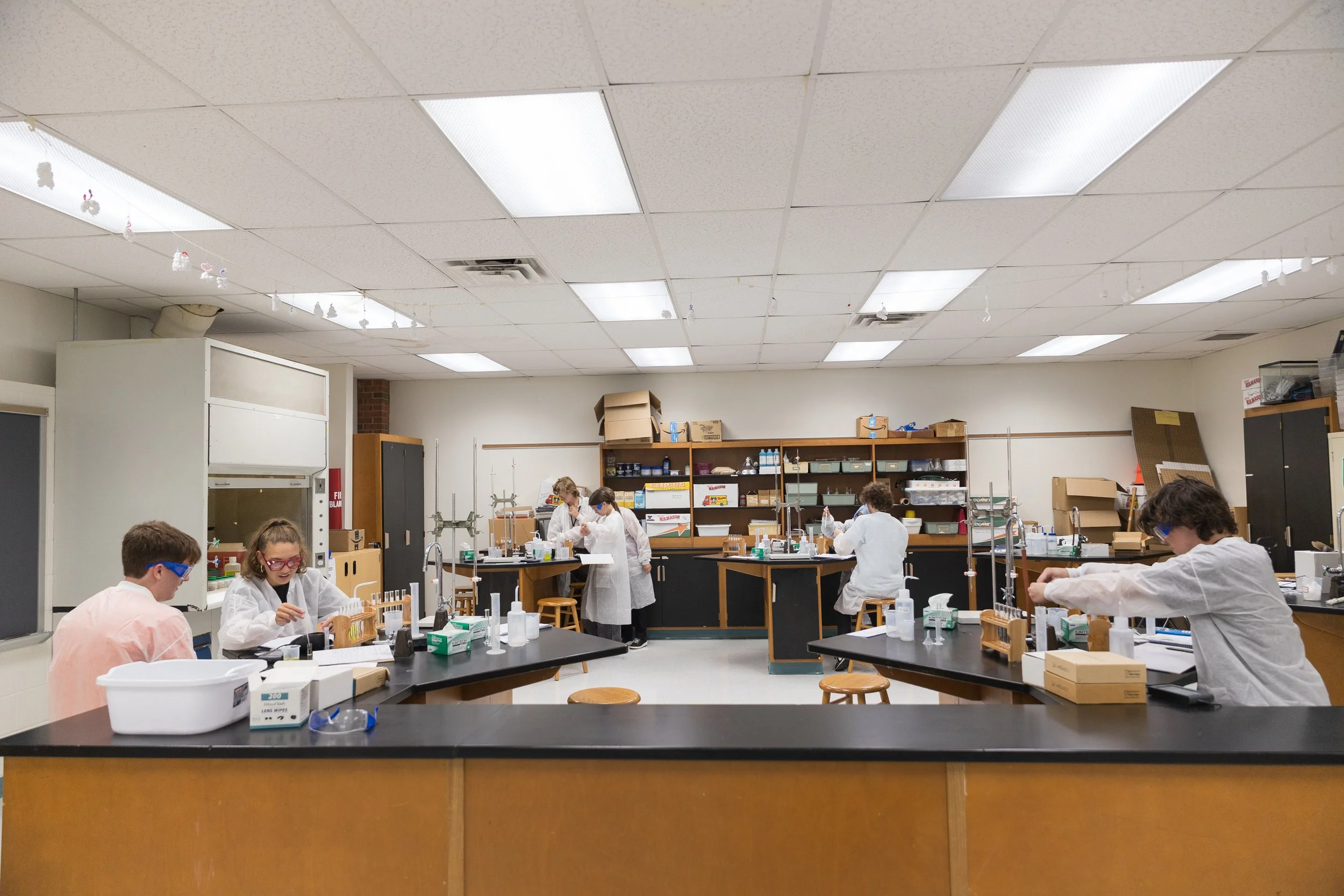 Students in a lab running some chemistry tests