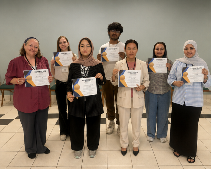 5 Day Accelerator Graduates holding their Certificate of Completion