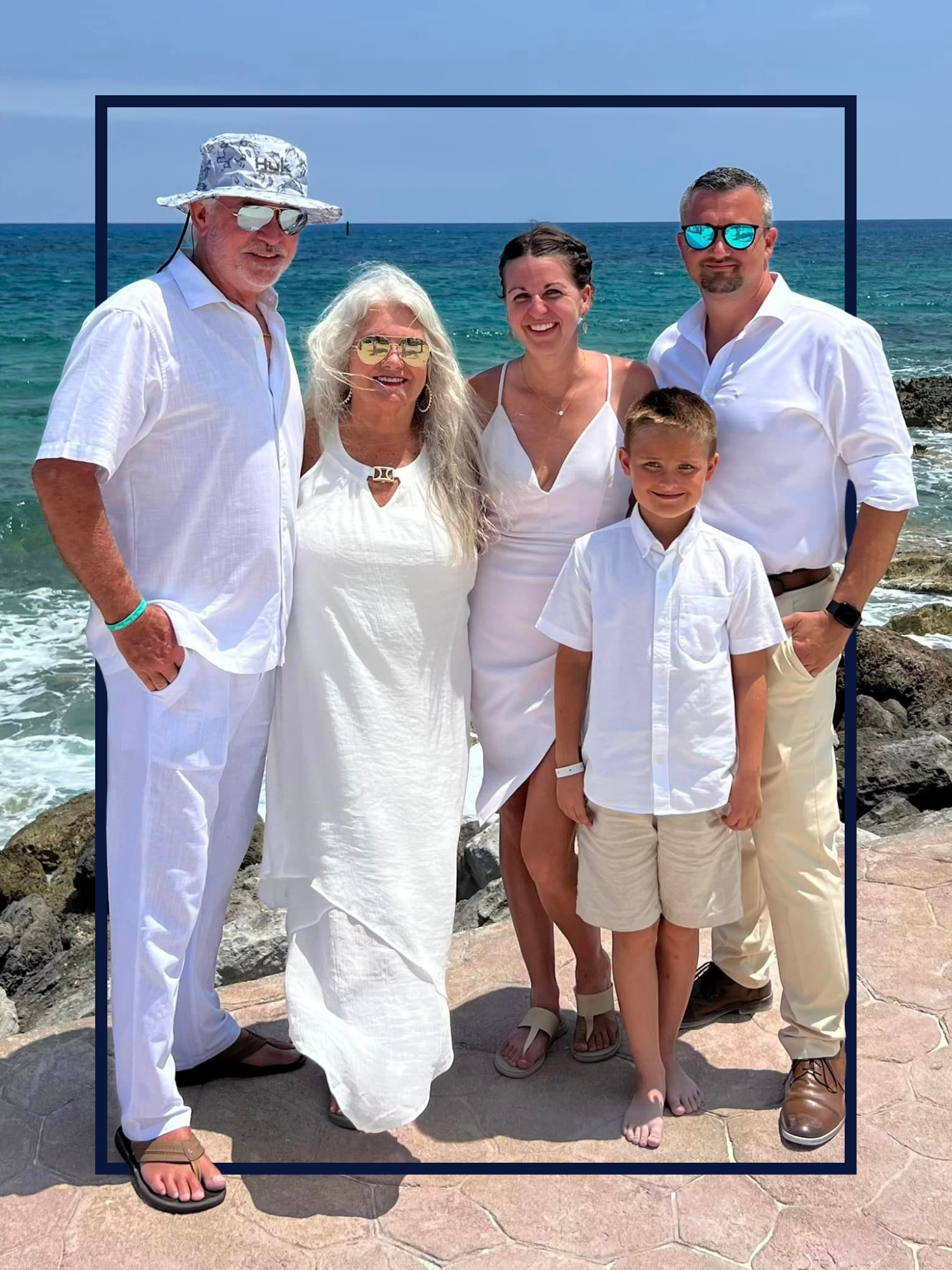 McGuire Real Estate Team family photo in Pace Florida including Mike, Paula, Emily, Elijah and Jason