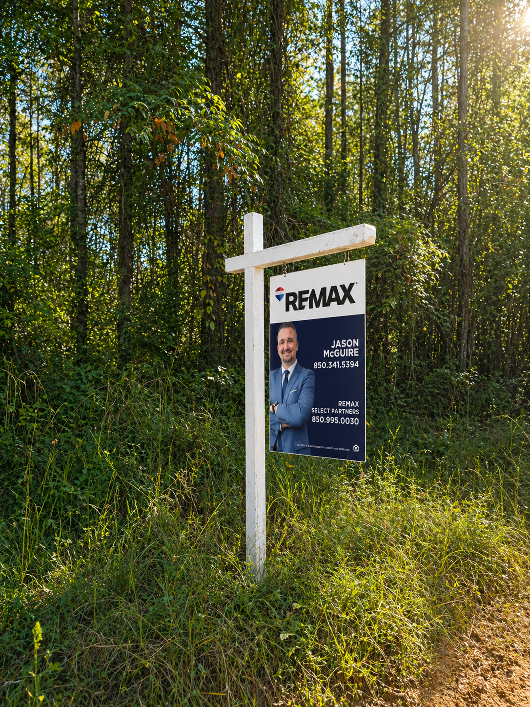 Land for sale in Uriah Alabama with open space and trees