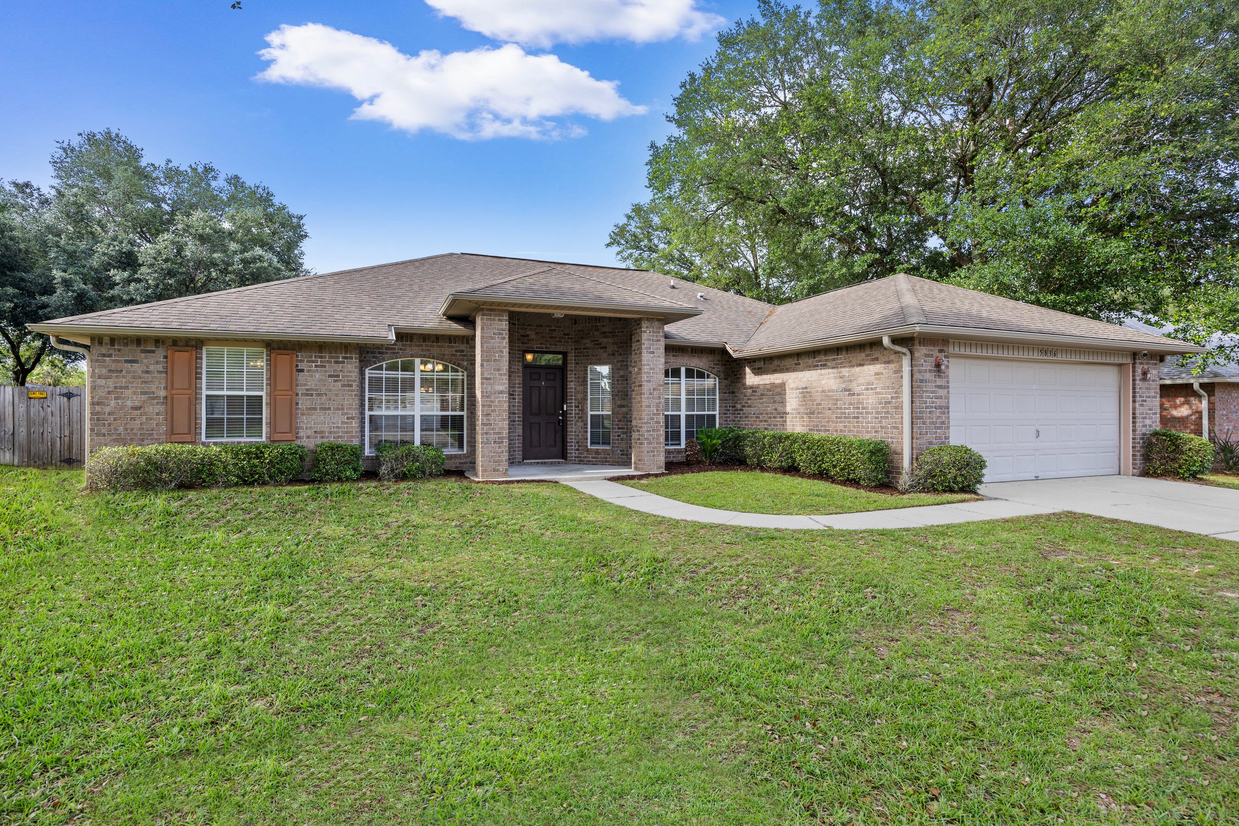 5836 Chi Chi Circle in Milton Florida is near Tanglewood Golf Course and for sale with the McGuire Real Estate Team