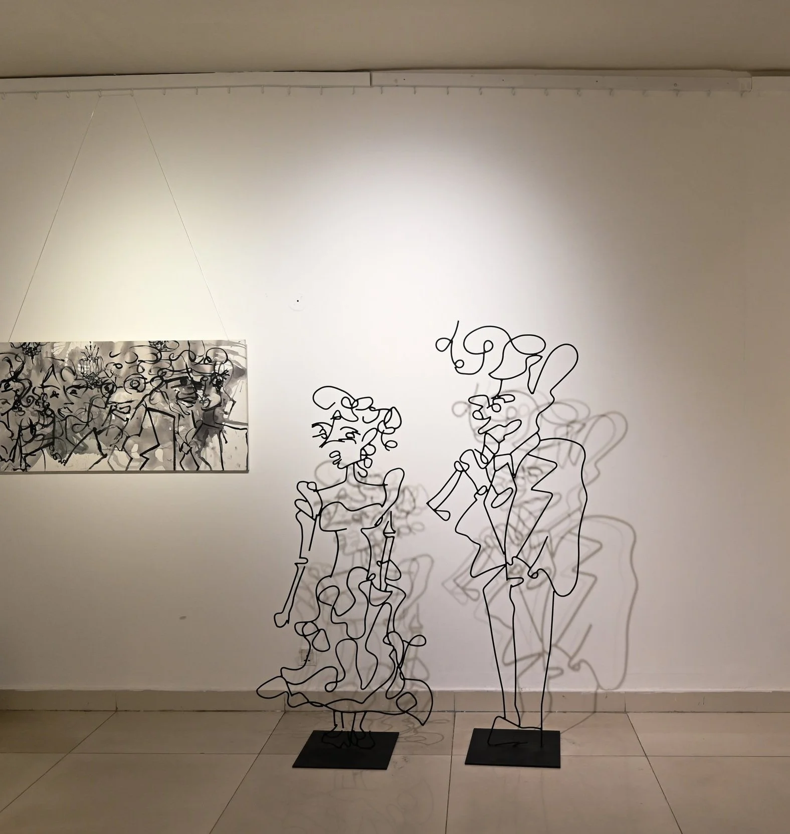 Rot Iron Sculpures / Left: The Lady In Waiting, 5 ft 2 inches / Right: The Mad Man, 6 ft 2 inches / displayed at Muse Art Gallery (solo) and Alliance Francaise de Lahore (solo)