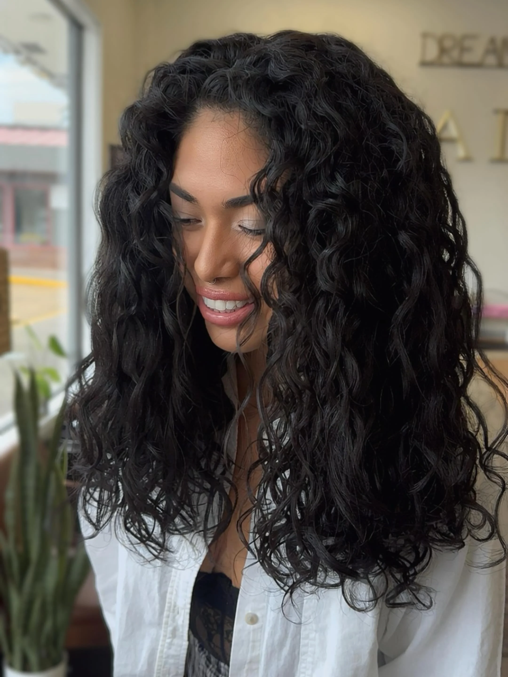 One ⭐️LUX curl cut later, and this beauty and her curls are refreshed for summer☀️

If your curls are feeling dry, dull, or triangular in shape, it&rsquo;s time to book a curl cut✂️

☀️Summer is here, and if you want your curls to look and feel their