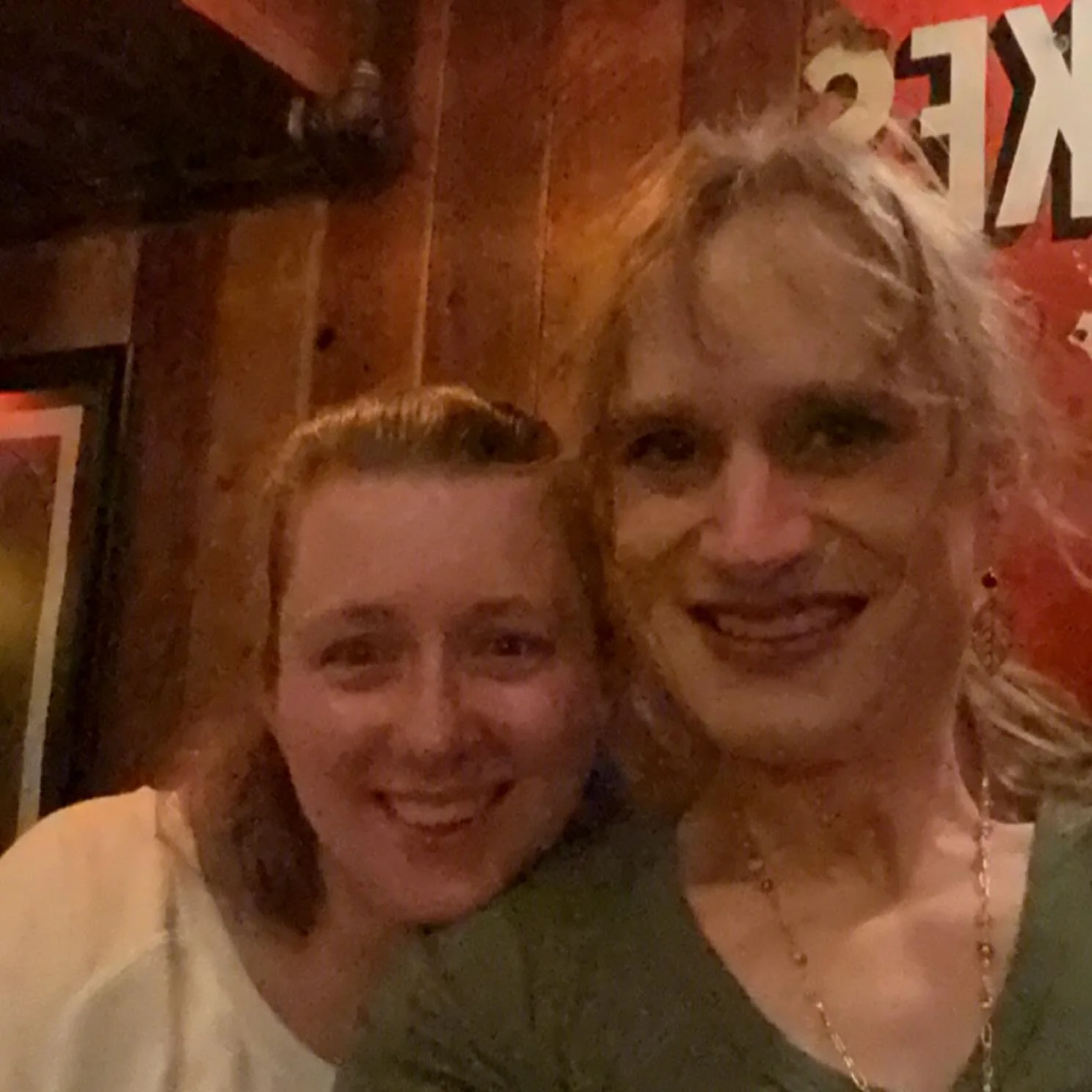 At the bar. Nicole is making fun of me for how long it takes to do stuff with technology.