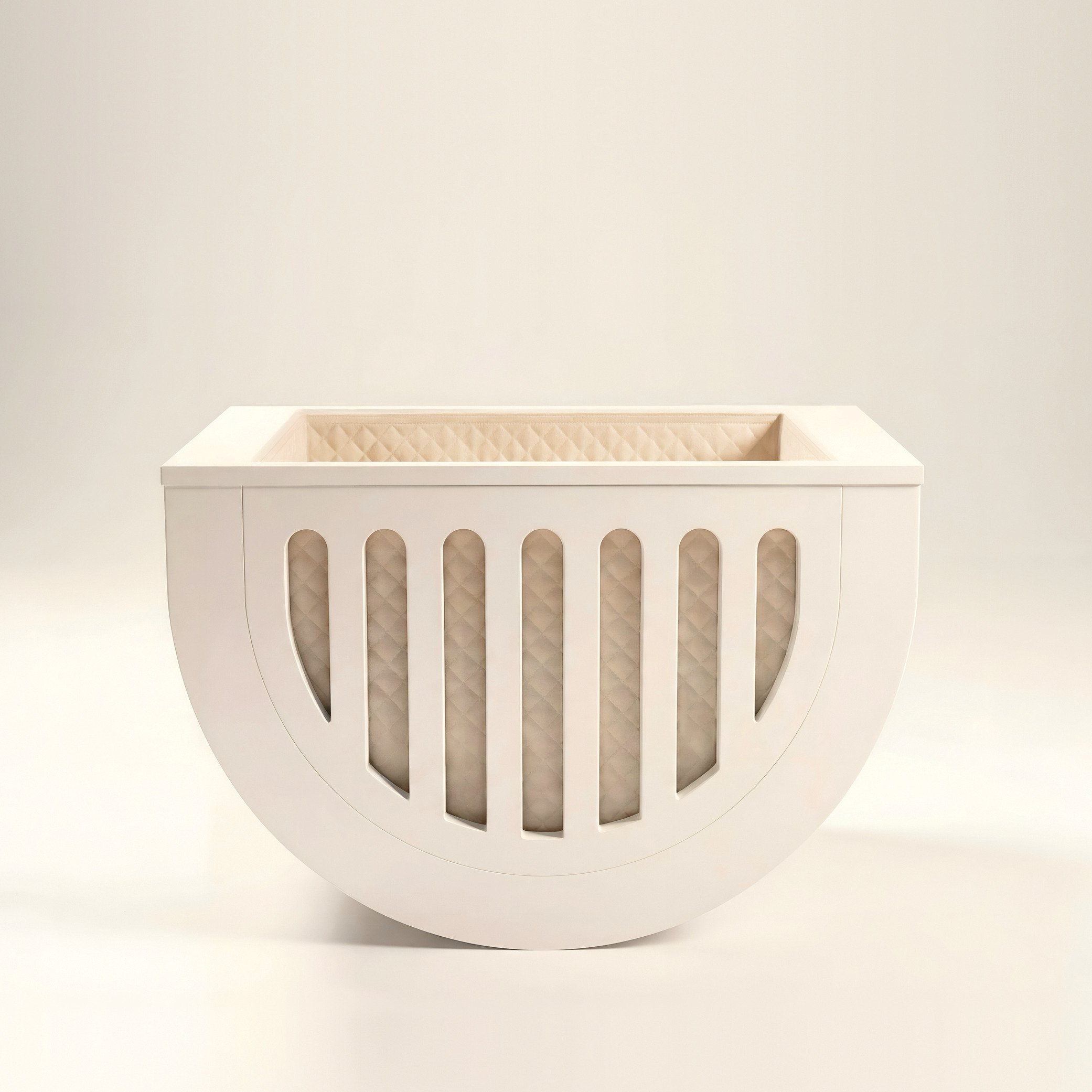 SUOMMO Moveo Mini Crib, luxury baby crib with a curved rocking base.