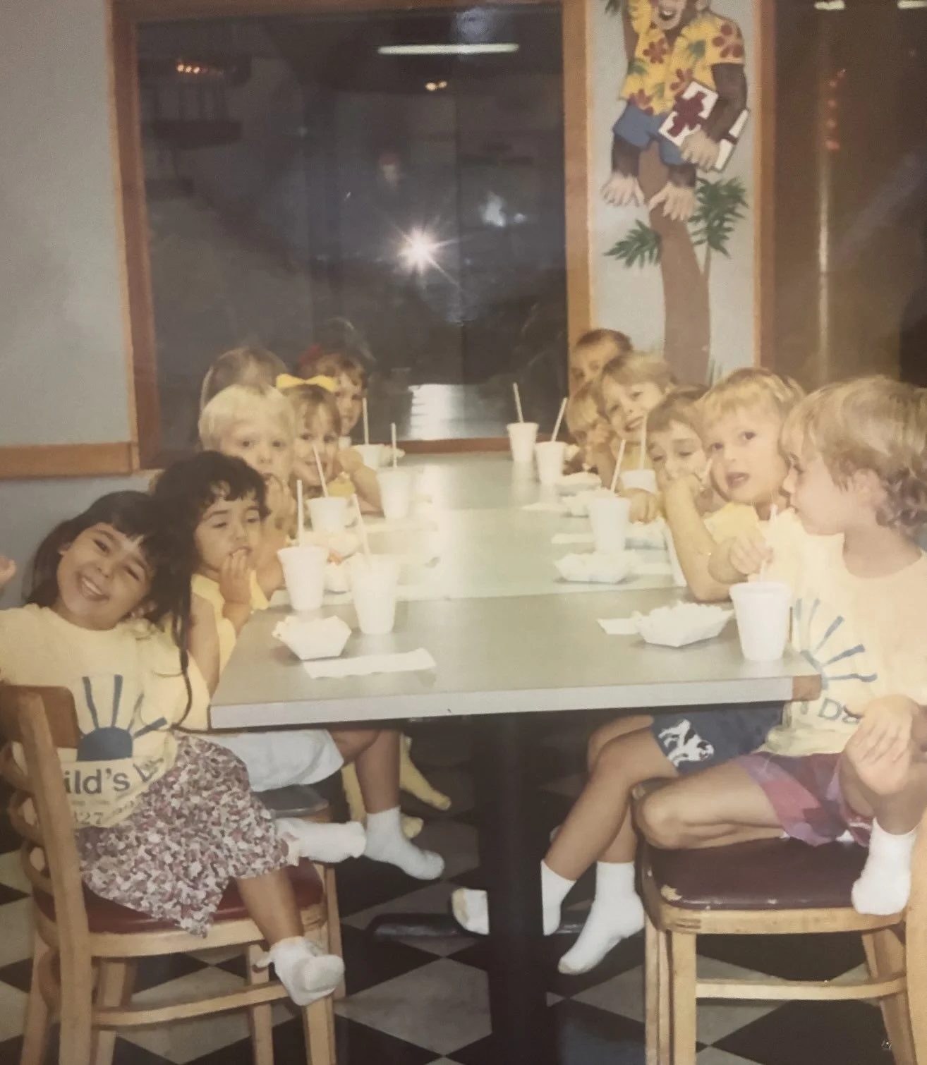 Two biracial sisters in their preschool class