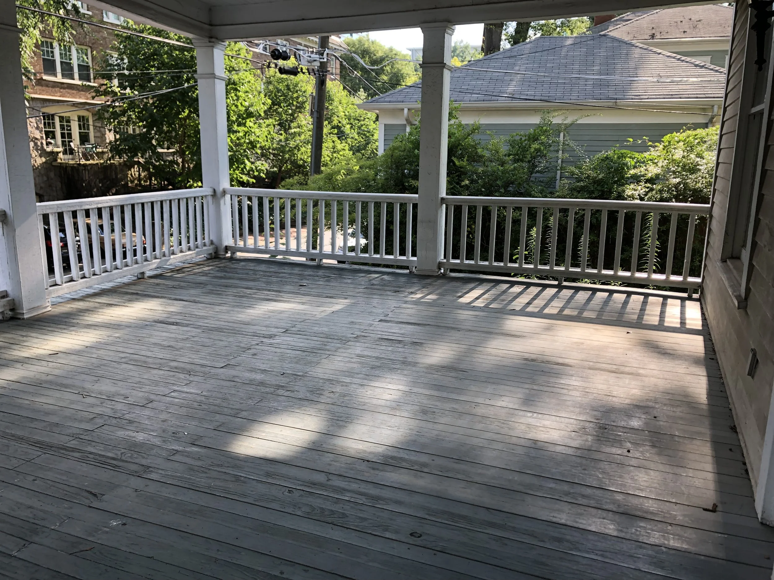 The "before" version of the home's front porch