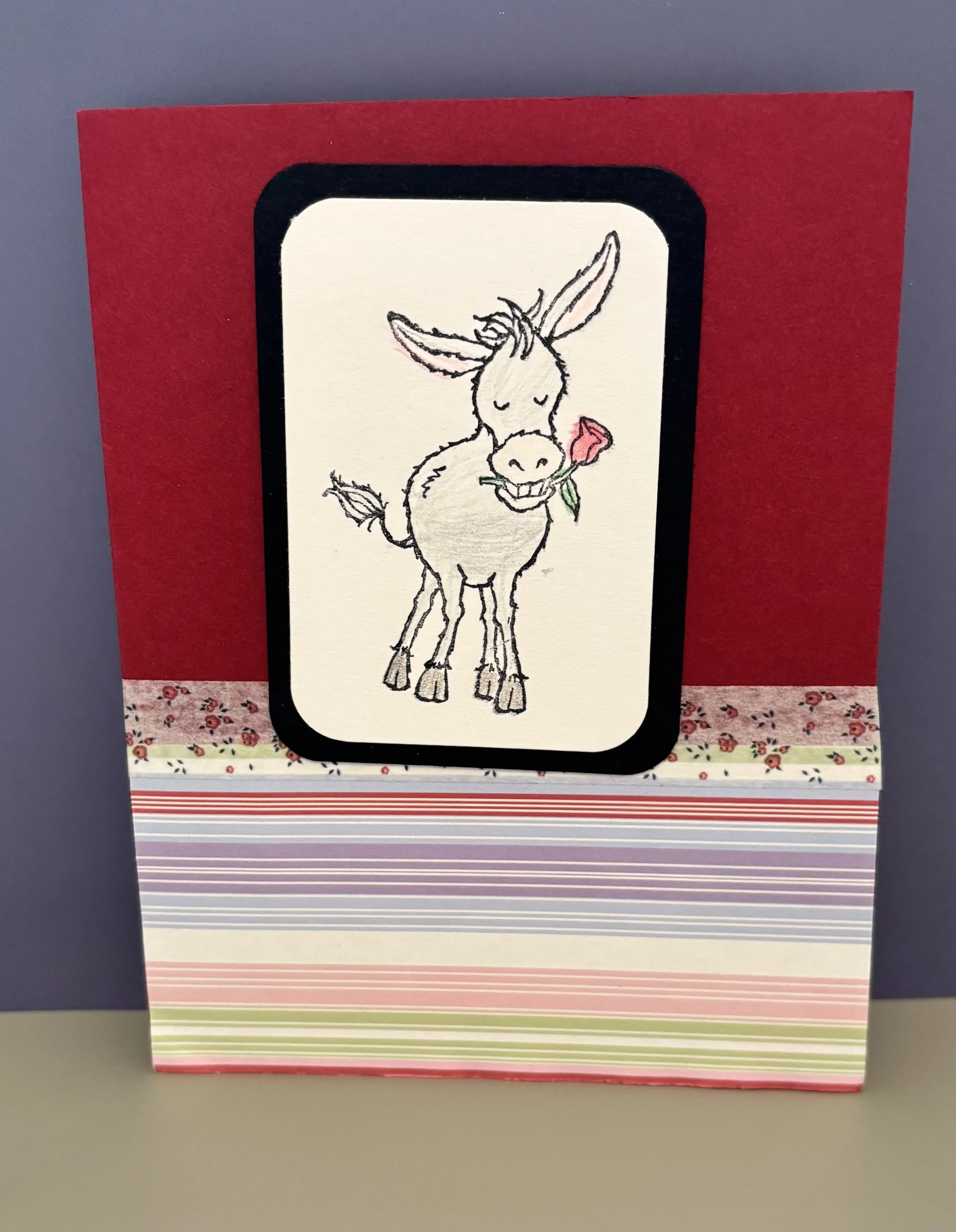 donkey with floweer.jpg