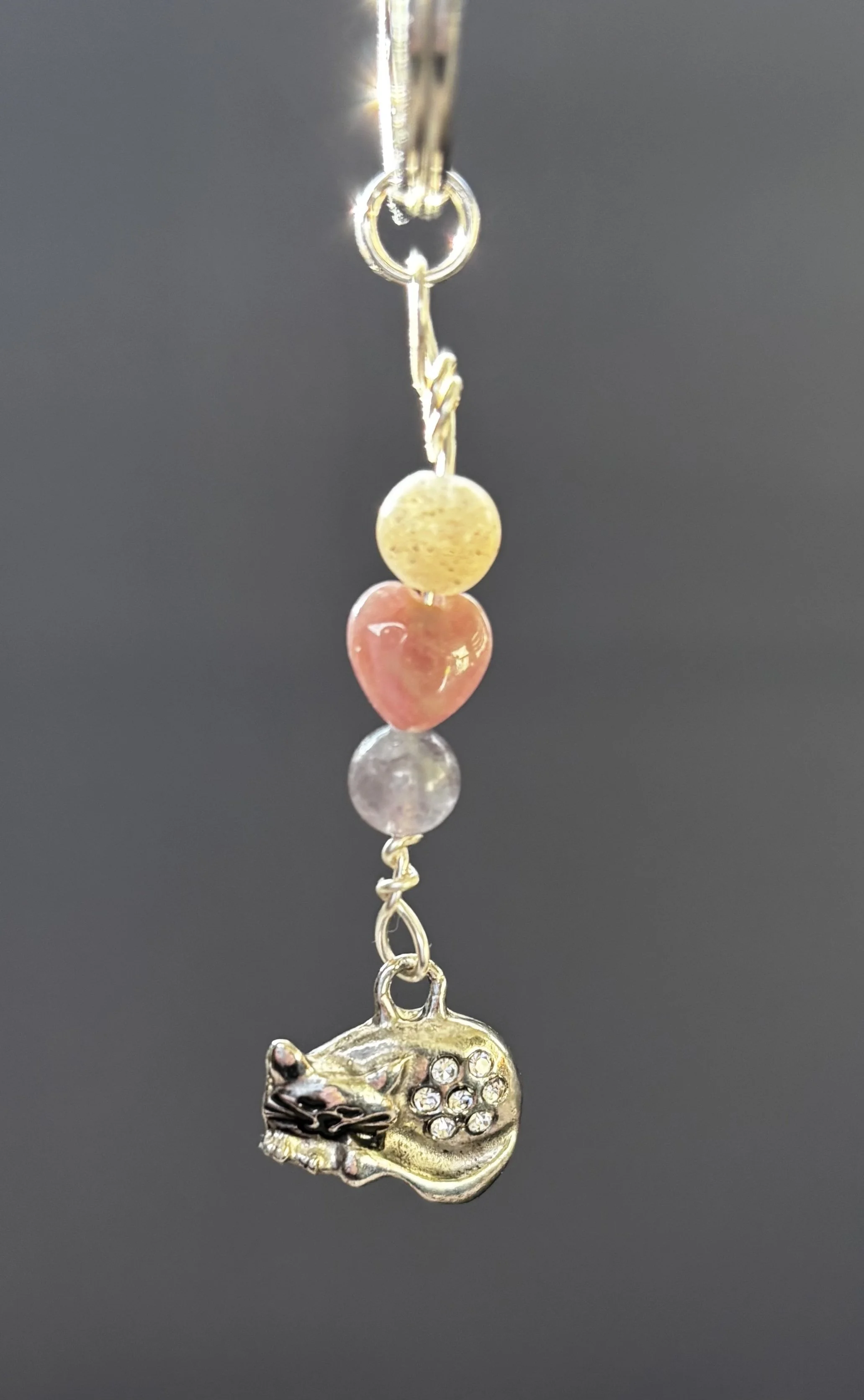 curled cat charm.jpg