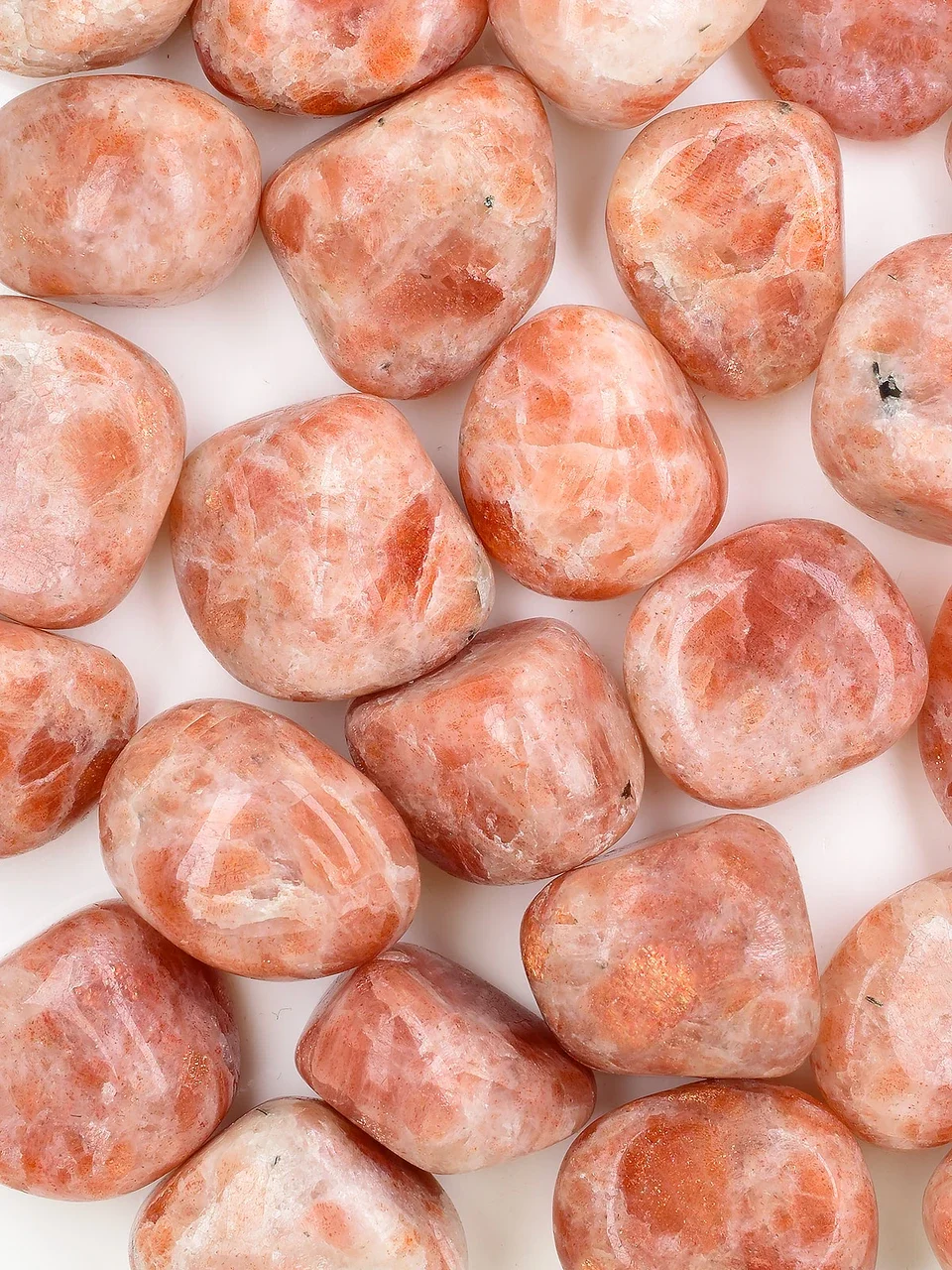 Sunstone crystals displaying shape and size variation.