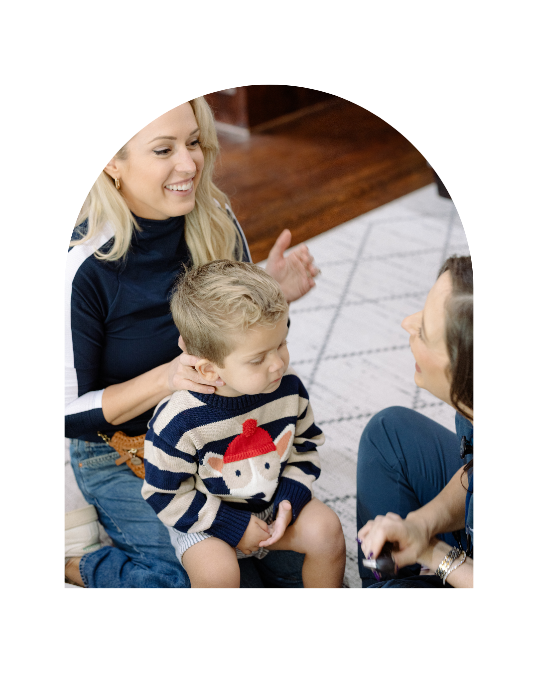 pediatric doctor talking to mother with her son discussing membership options