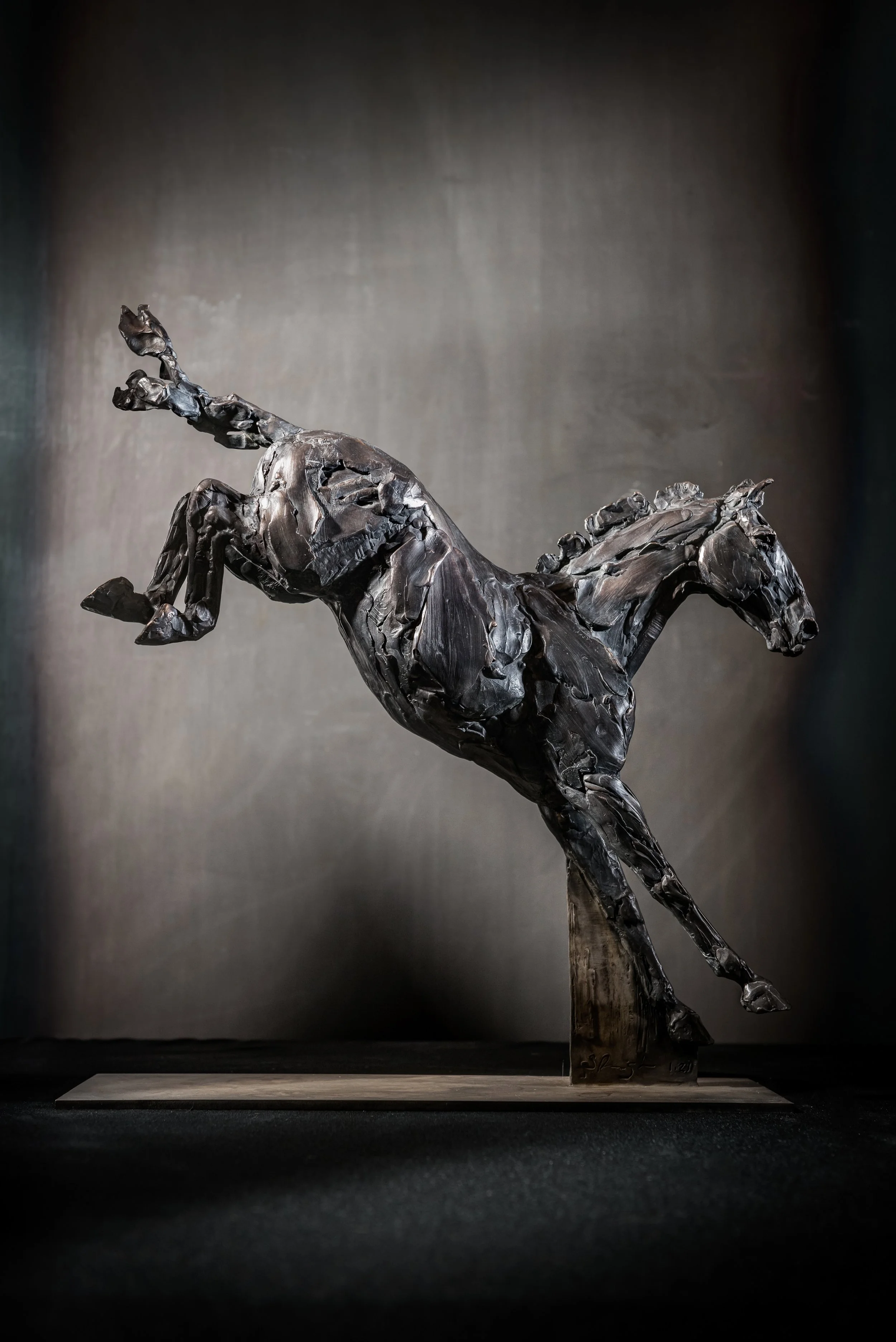Jumper II Bronze jumping horse sculpture by Stephanie Revennaugh