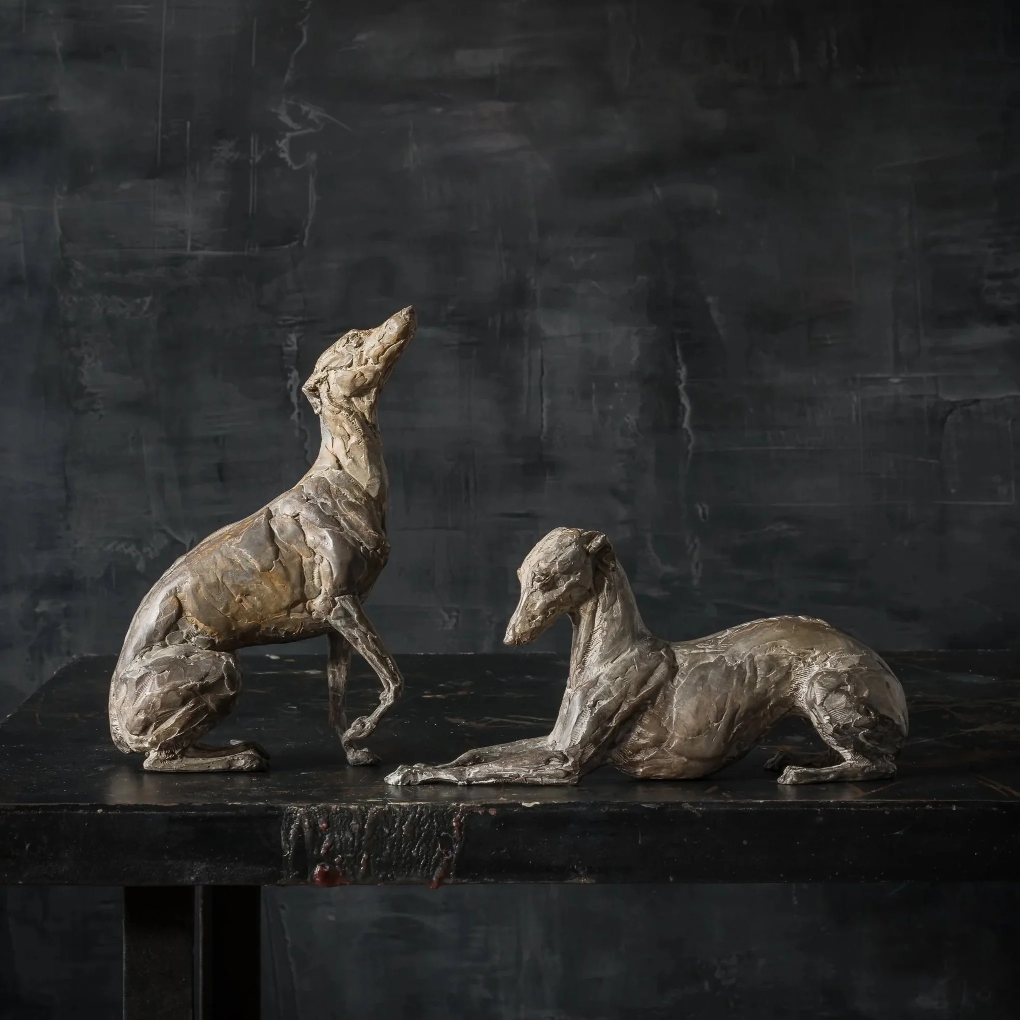 Bijou and Chloe, bronze whippet sculptures by Stephanie Revennaugh