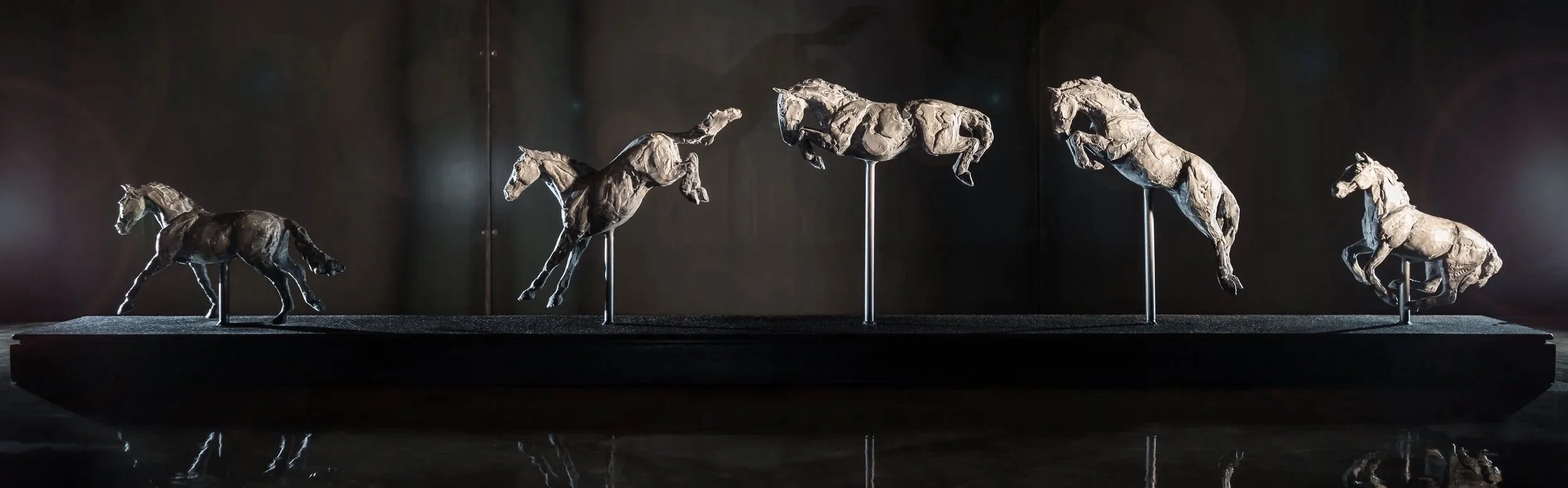 Bascule, bronze jumping horse sculpture by Stephanie Revennaugh