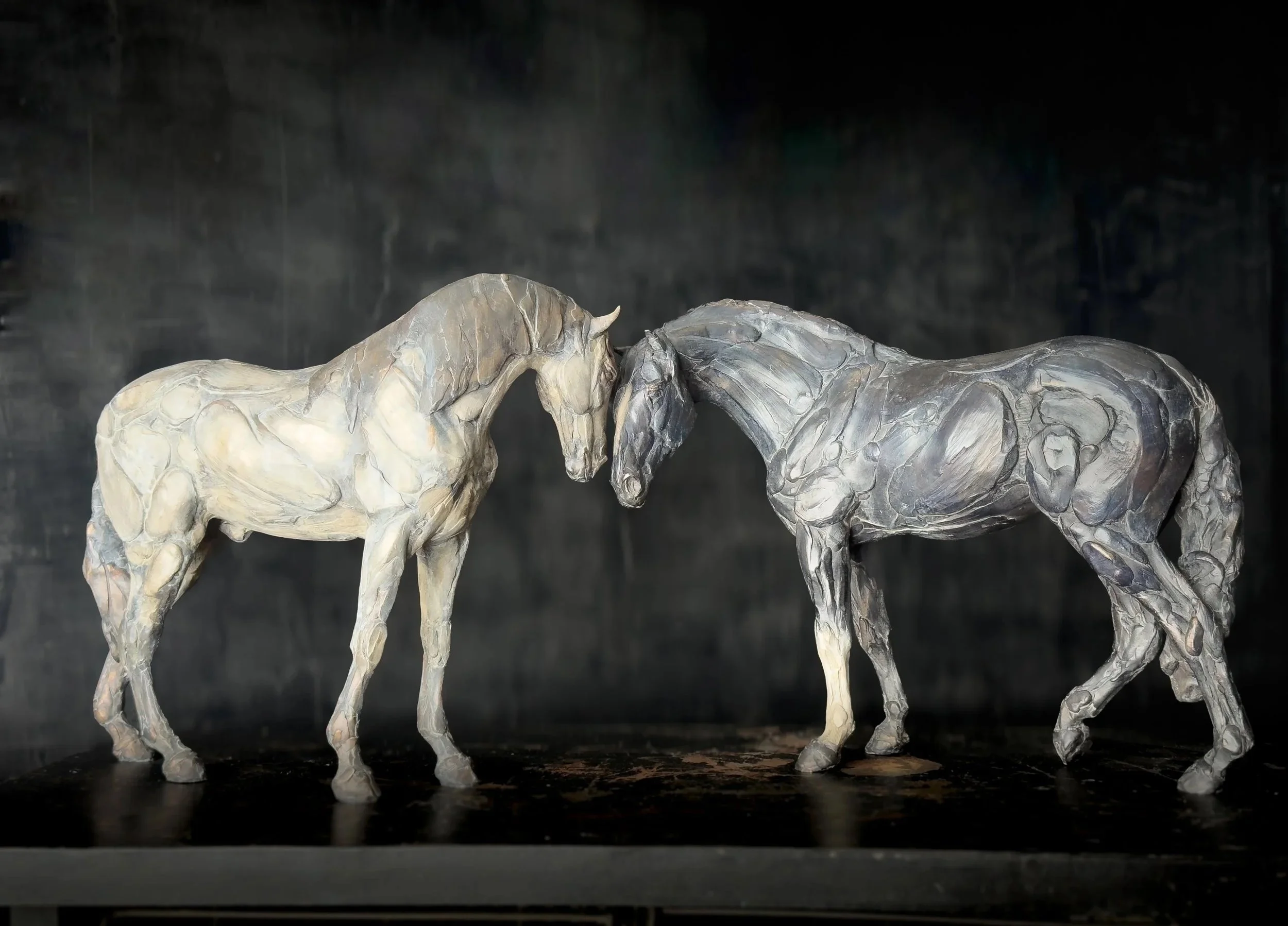 Equinox, bronze horse sculpture by Stephanie Revennaugh depicting two horses greeting