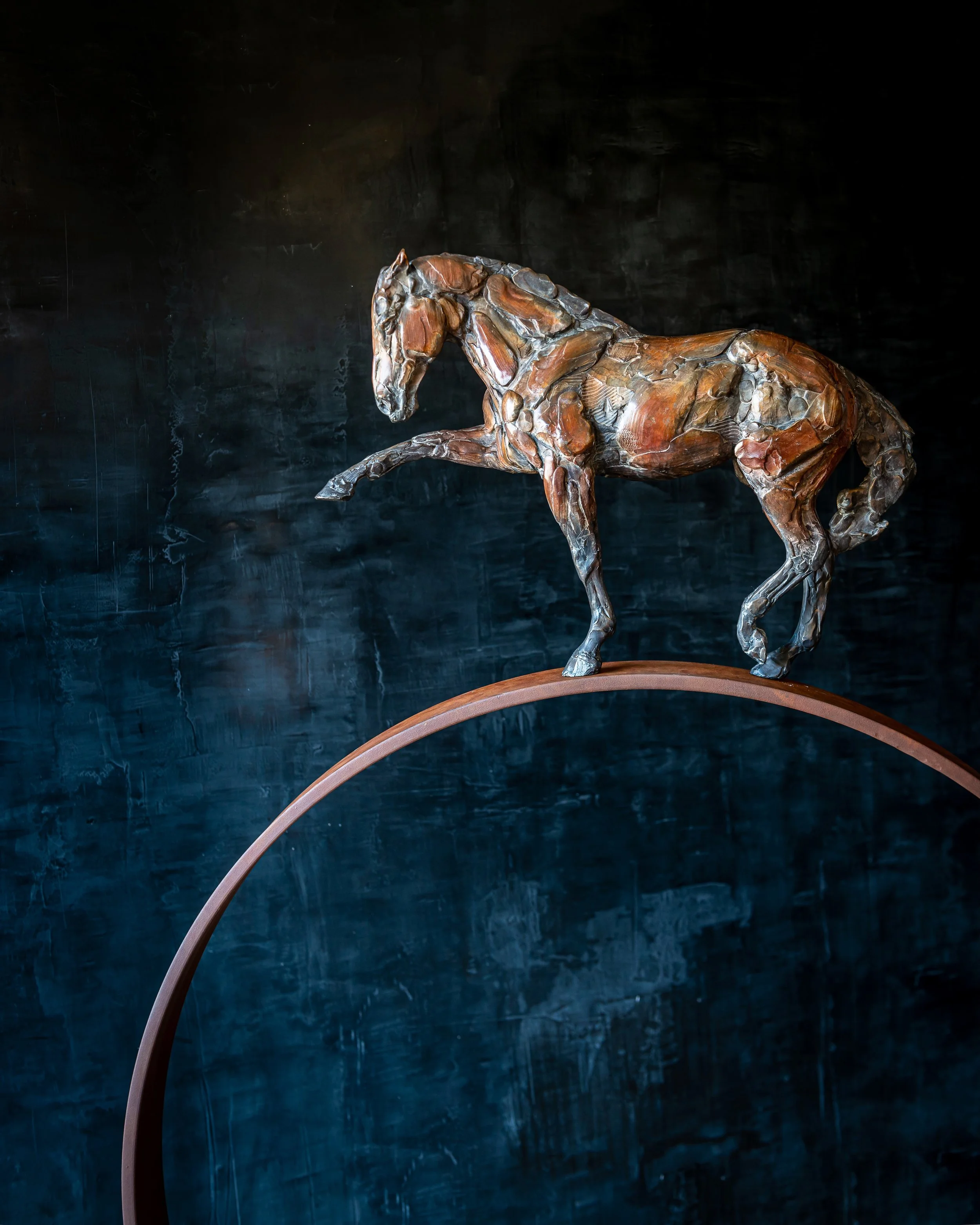 Con Brillo, Bronze horse sculpture by Stephanie Revennaugh depicting Andalusian horse performing  Spanish Walk
