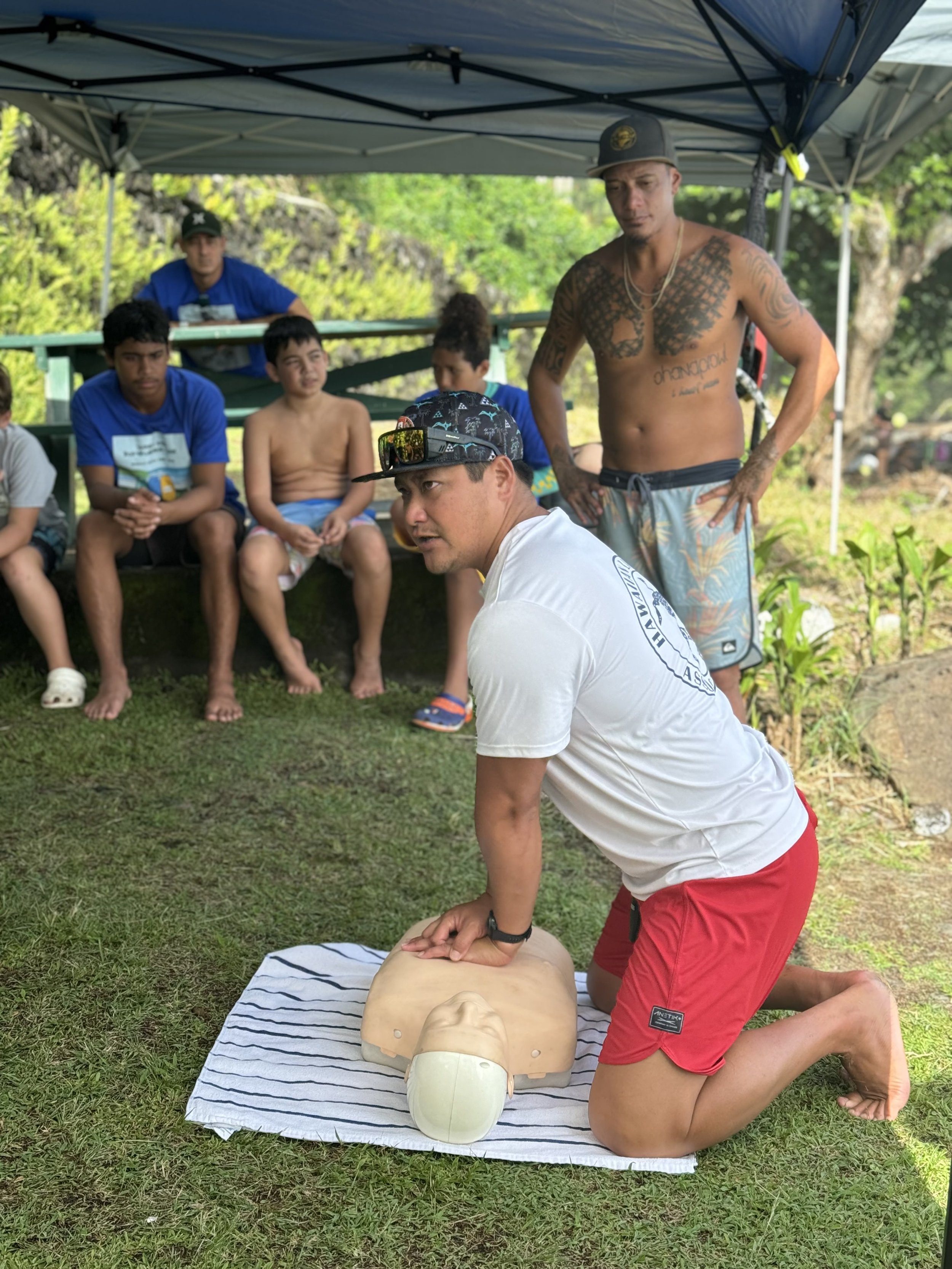 First-Responder Uncle Bradley gives an exhibition on CPR and First Aid