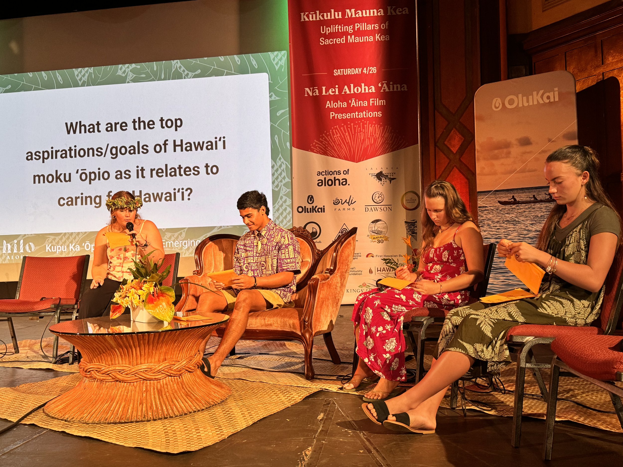 Hui Hoʻāuhuli, in partnership with Hilo Aloha, hosted their first public event, Kupu Nā ʻŌpio at Palace Theater in Hilo during Merrie Monarch Week 2025. Shown here are Kumu Trevor Atkins and kanaka filmmakers ʻĀina Paikai, and Lāiana Kanoa-Wong as we