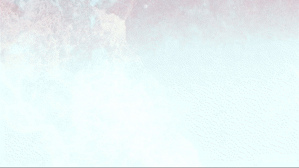 A serene lake with calm water reflecting a clear sky and surrounding mountains.