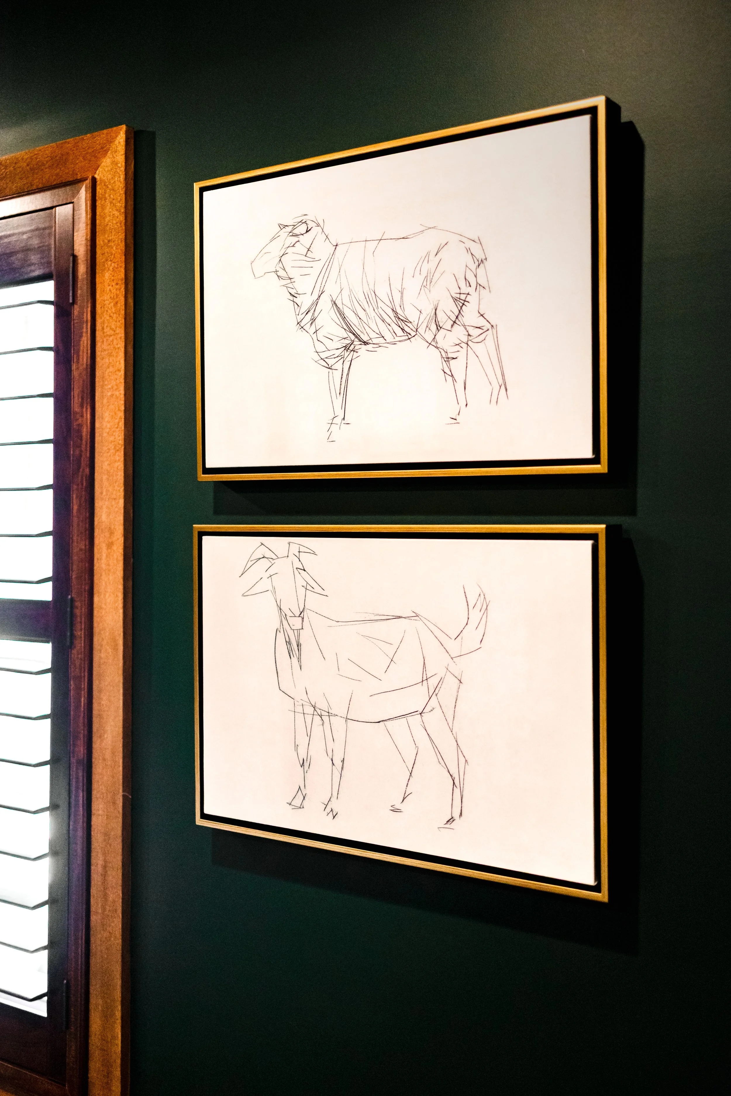 A refined cigar and whisky bar lounge designed by Cossart Design, where rich materials, warm lighting, and custom millwork come together to create a sophisticated retreat within this custom Southern home. Thoughtfully layered textures and bespoke sea