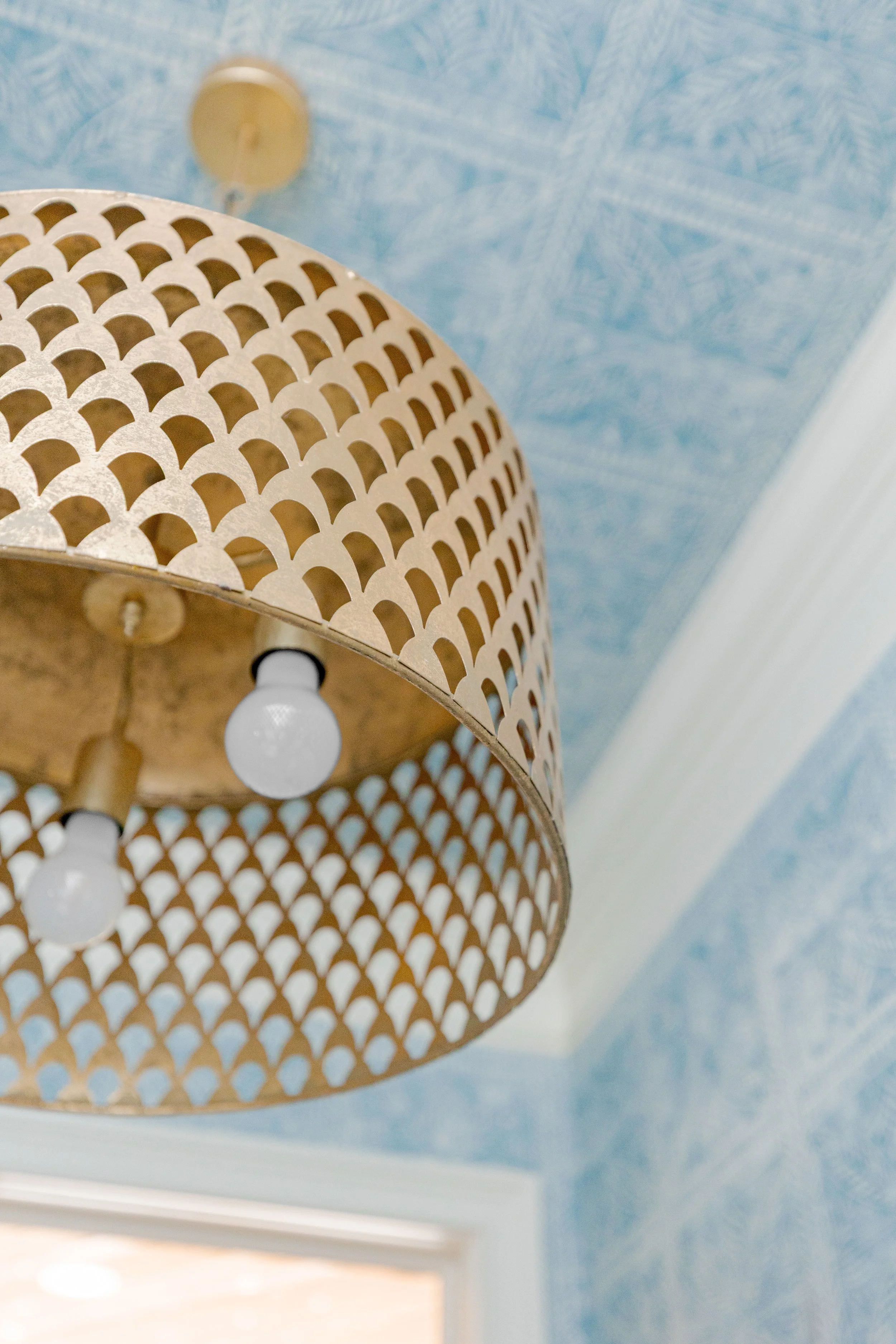 This bathroom was designed to feel both functional and elevated. Clean lines, thoughtful finishes, gold hardware with textured, bright wallpaper, and intentional details bring a sense of ease and refinement to an everyday space.

#InteriorDesign #Bat