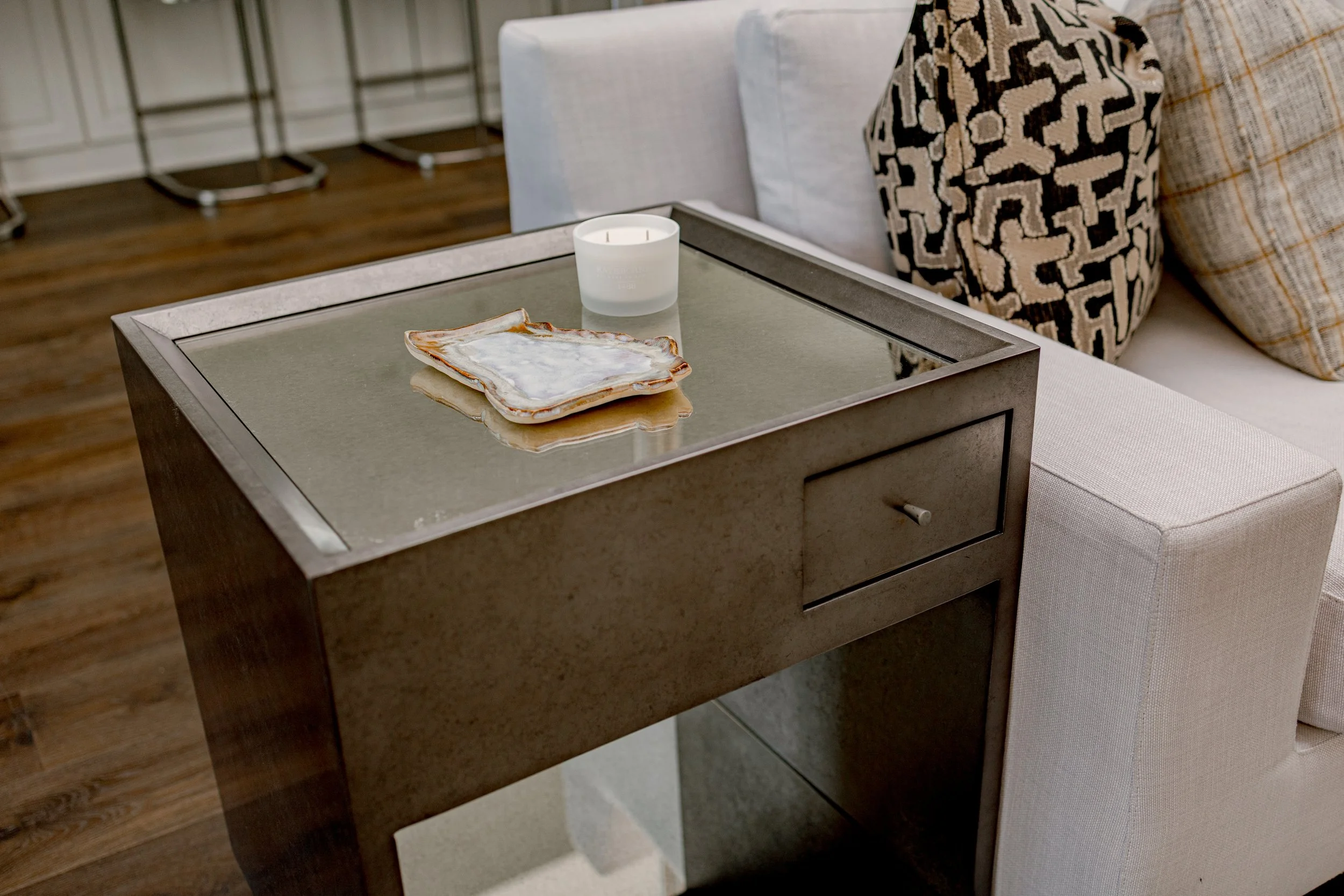 Thoughtfully selected custom design elements bring personality, function, and elevated detail to every corner of the home. From tailored lighting and mirrors to bespoke barware and decorative accents, each piece was curated to complement the space an