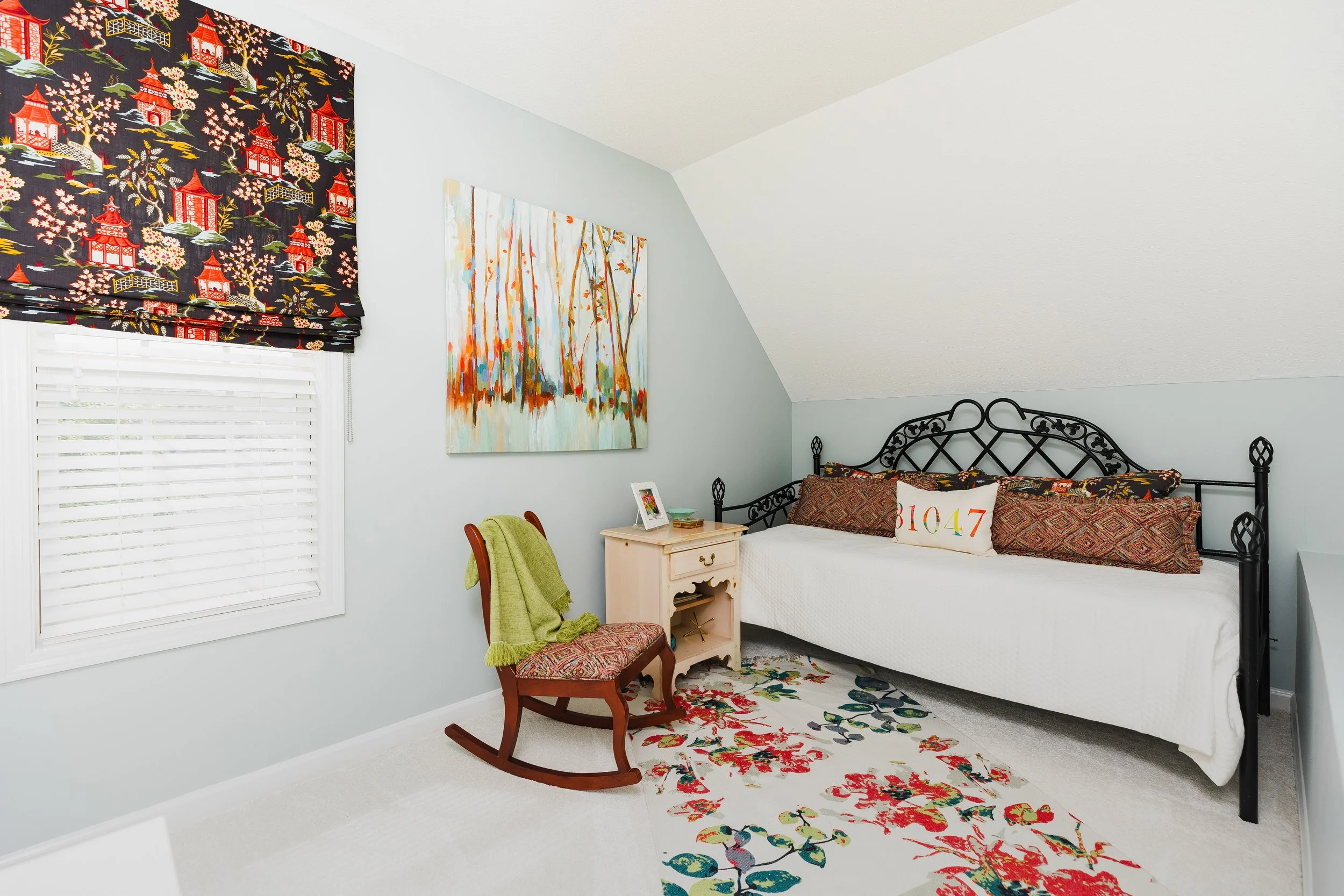 A versatile flex room by Cossart Design, featuring a day bed, layered textures, and custom accents. This space balances functionality and style, ideal for guests, lounging, or additional family activities while maintaining a cohesive Southern aesthet